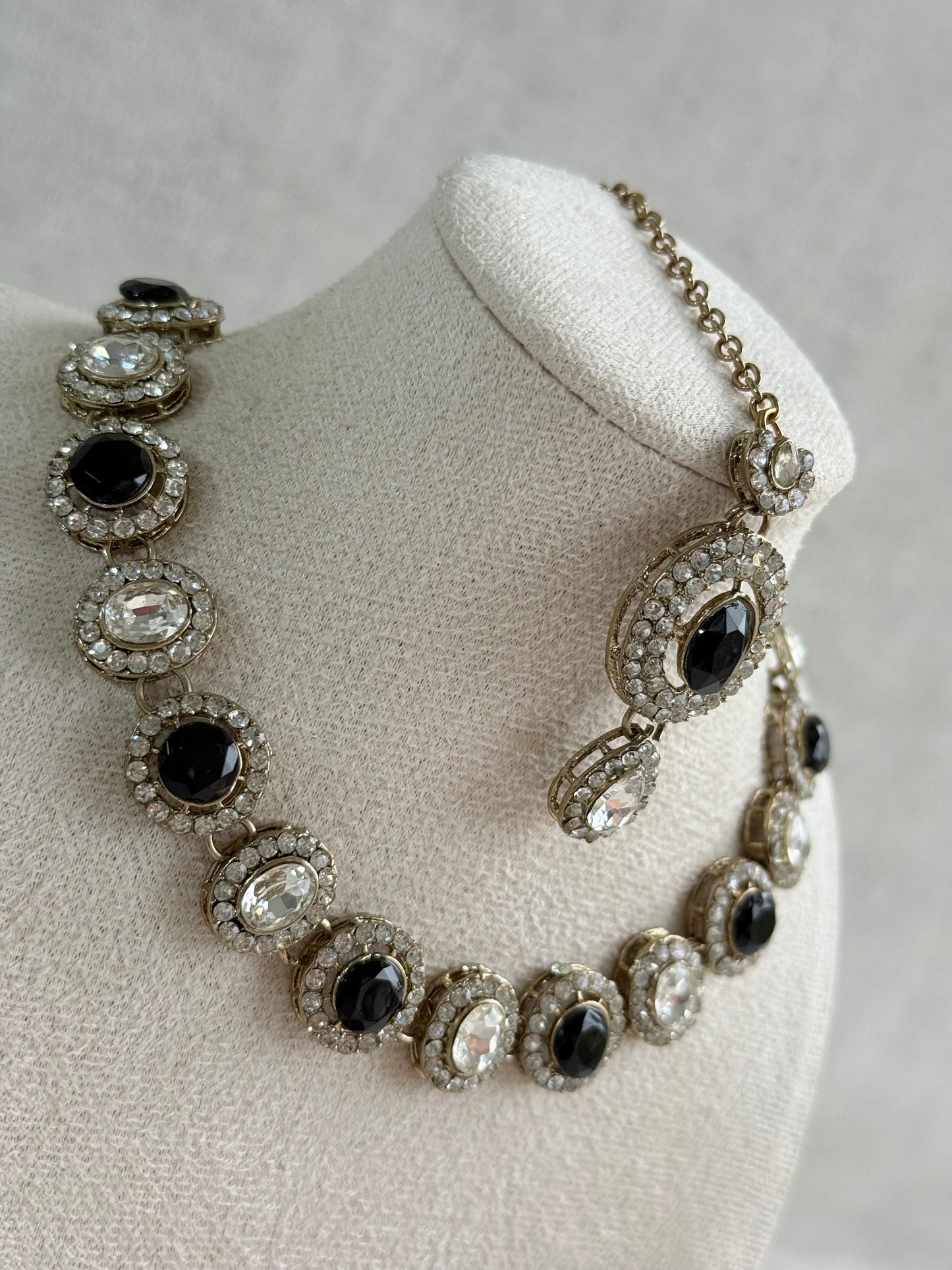 Ayura Designs Eira Necklace Set with Earrings & Tikka – Black & Crystal Stones with Antique Gold Finish