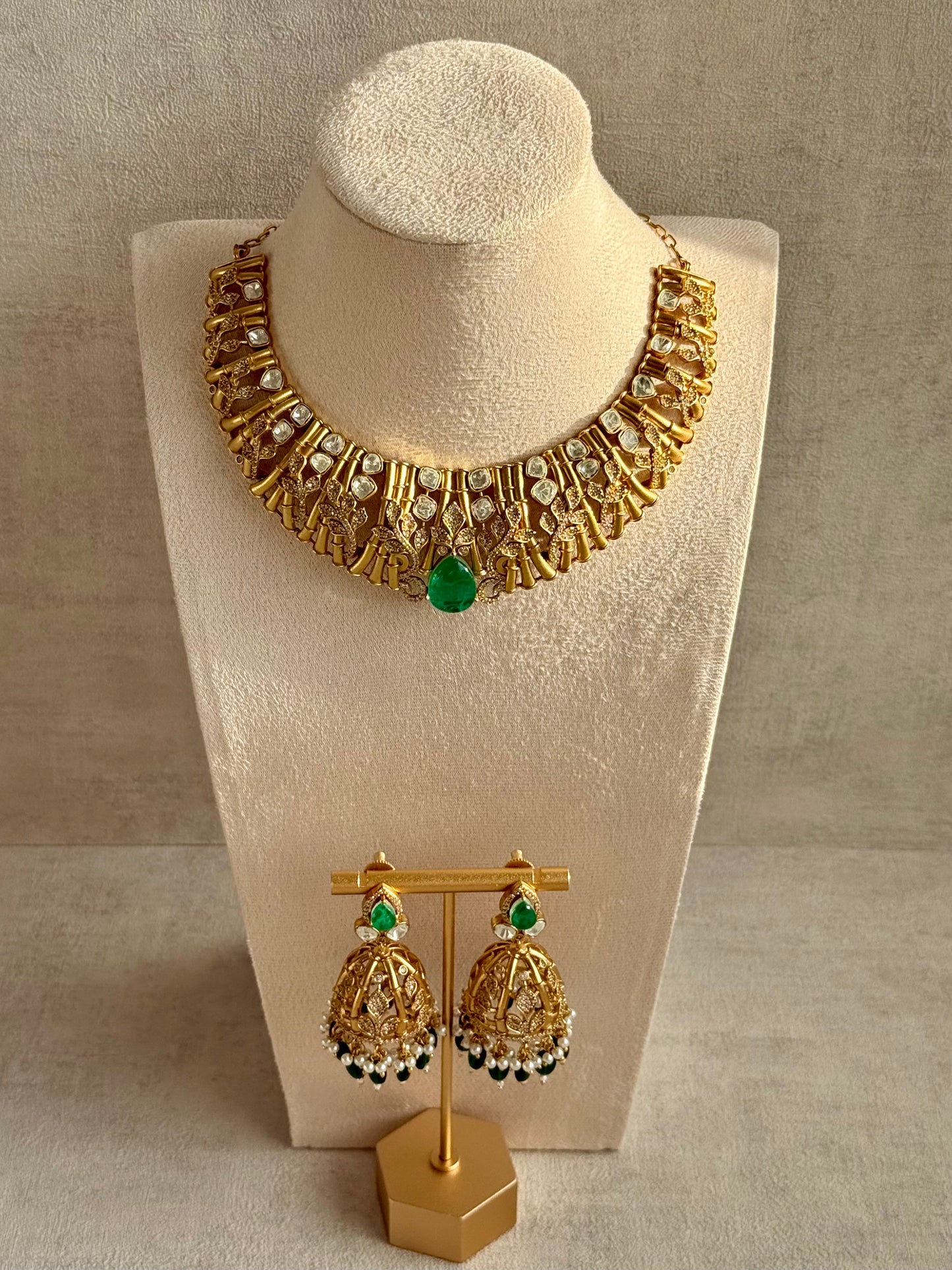 Ayura Designs Rami Collar Set with Jhumkis – Sculpted Gold Collar with Emerald Green Stone and Crystal Detailing