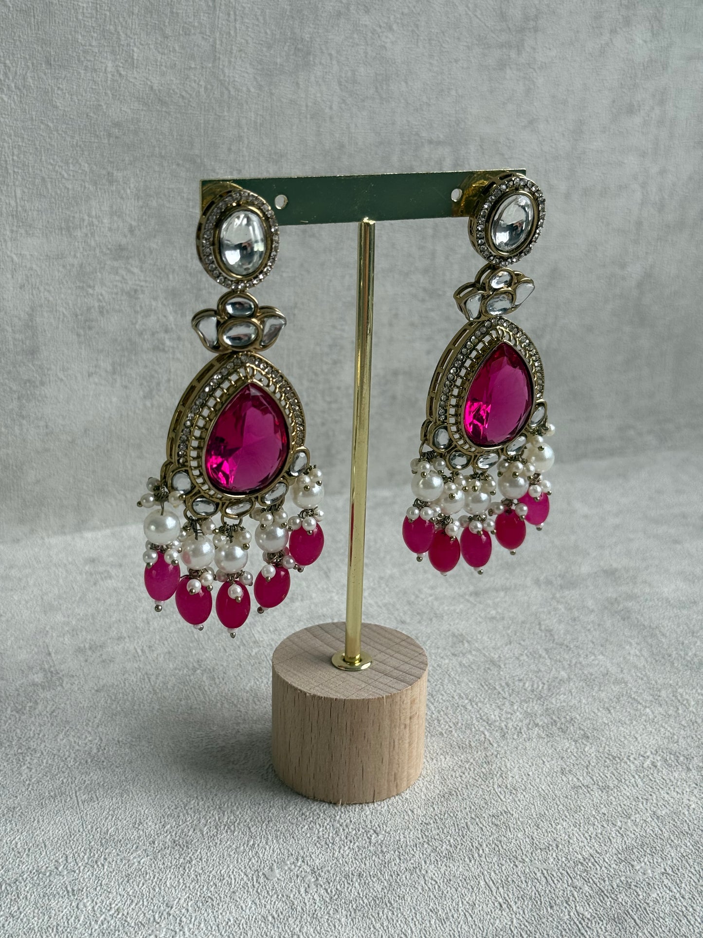 Ayura Designs Nageen Earrings – Antique Gold Jhumkis with Hot Pink Stones, Mirror-Cut Accents & Pearl Drops