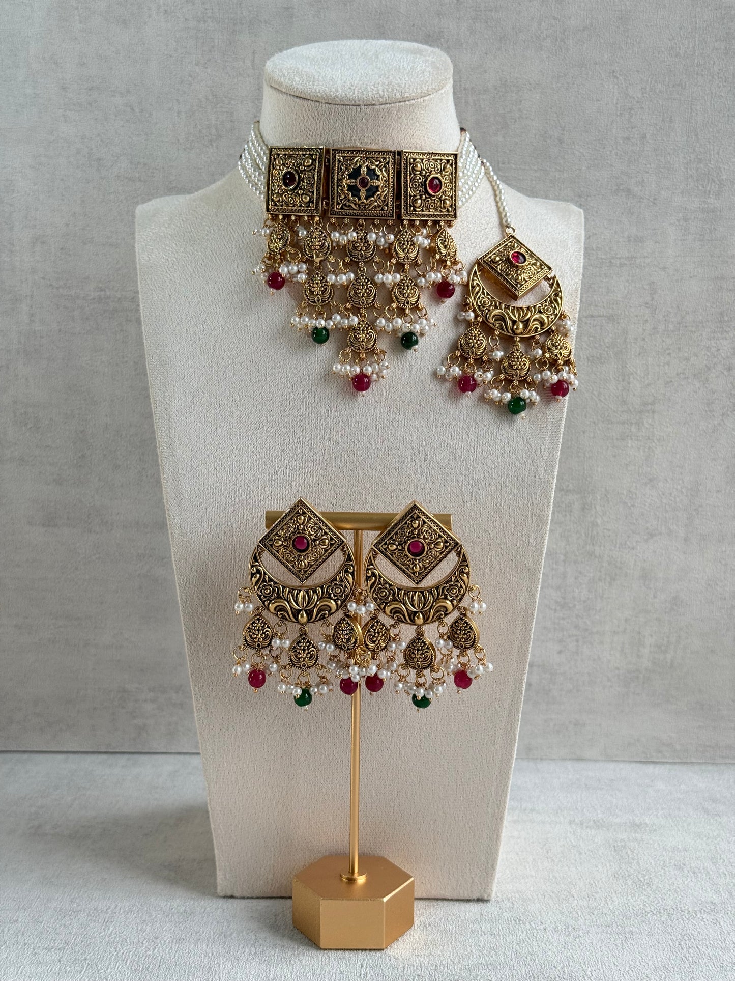 Ayura Designs Samera Choker Set with Earrings & Tikka – Rani Pink & Emerald Green Beads, Pearl Detailing, Green Centre Stone, Floral Motifs & Antique Gold Finish