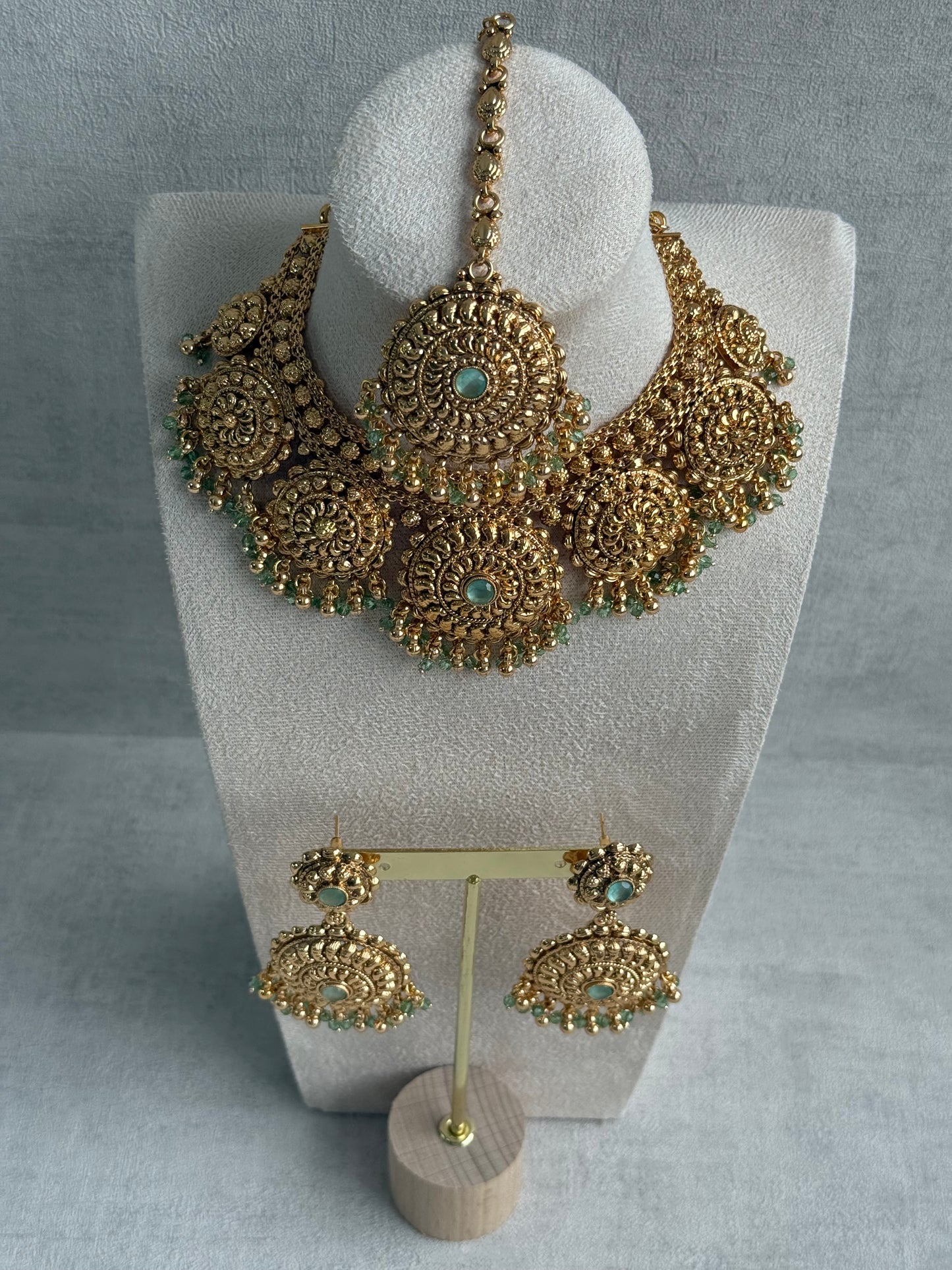 Ayura Designs Rummy Set – Statement Necklace, Earrings & Tikka with Pistachio Green Beads and Polished Gold Finish