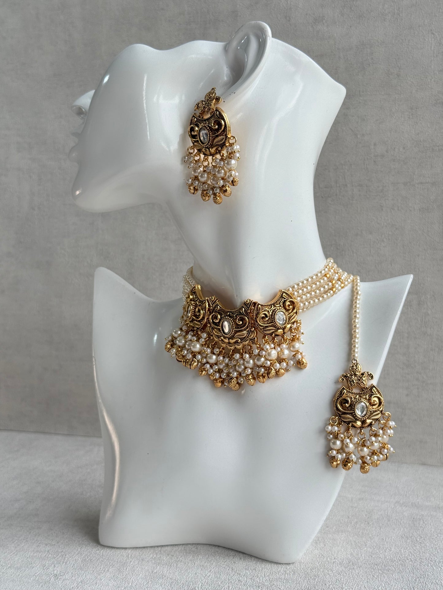 Ayura Designs Sneha Choker Set with Earrings & Tikka – Ivory Beads, Layered Pearl Detailing, Ghungroos & Antique Gold Finish