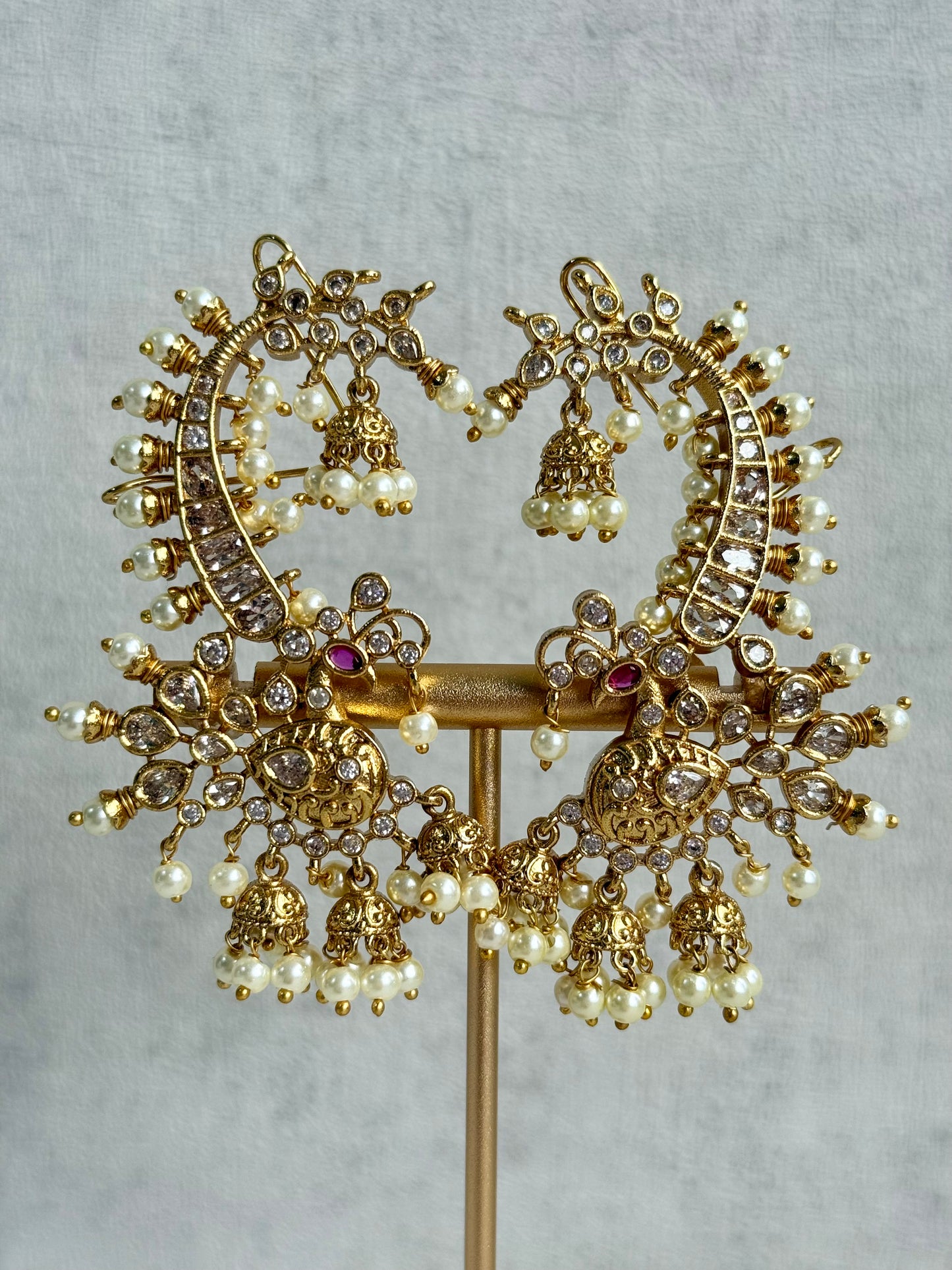 Ayura Designs Megha Half Ear Cuff Earrings – Gold Peacock Motif with Kundan Crystals, Pink Stone Accents & Pearl Jhumka Drops