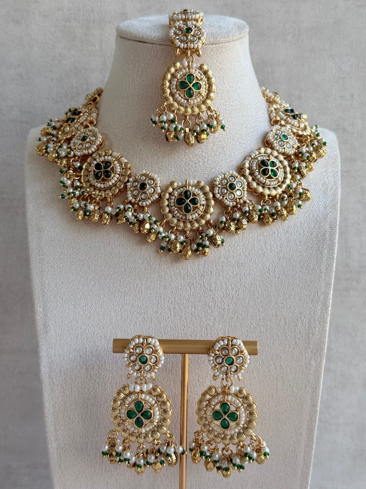 Ayura Designs Manika Necklace Set with Earrings & Tikka – Gold Finish with Emerald Green Stones, Pearls & Ghungroos