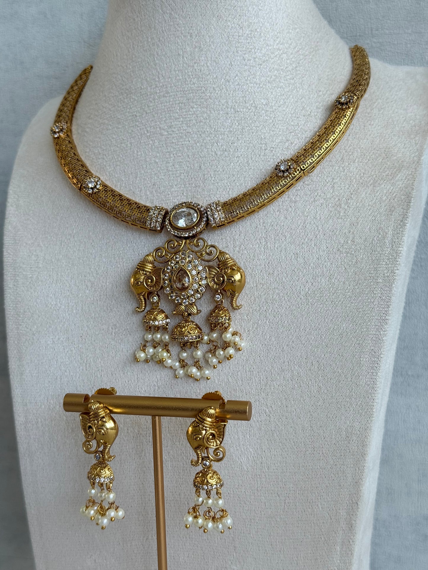 Ayura Designs Wadha Collar Necklace Set with Earrings – Gold Elephant Pendant & White Crystal Detailing