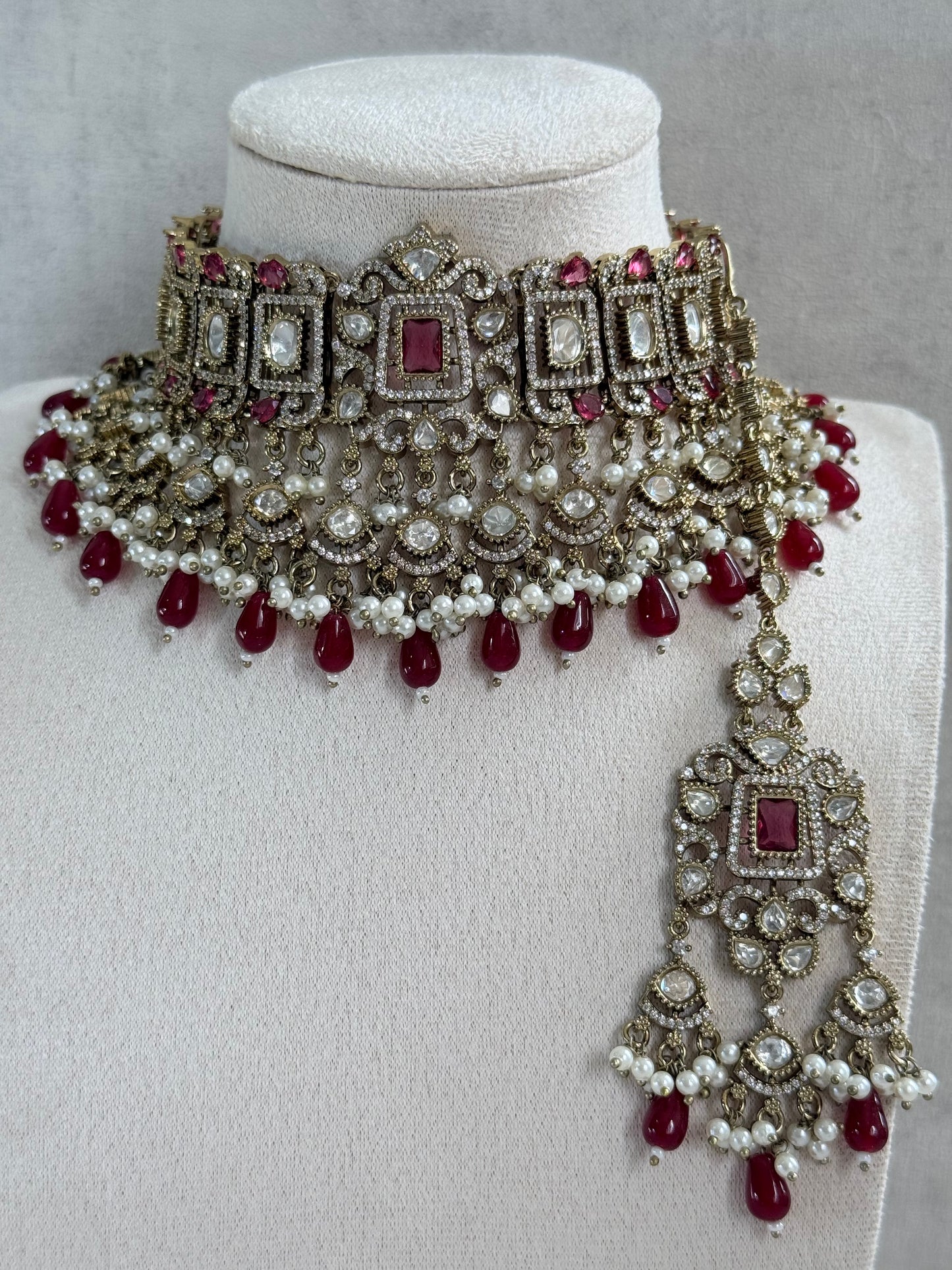 Ayura Designs Aisha Choker Set with Earrings & Tikka – Rani Pink Stones, Red Beads, Polki & Pearl Detailing