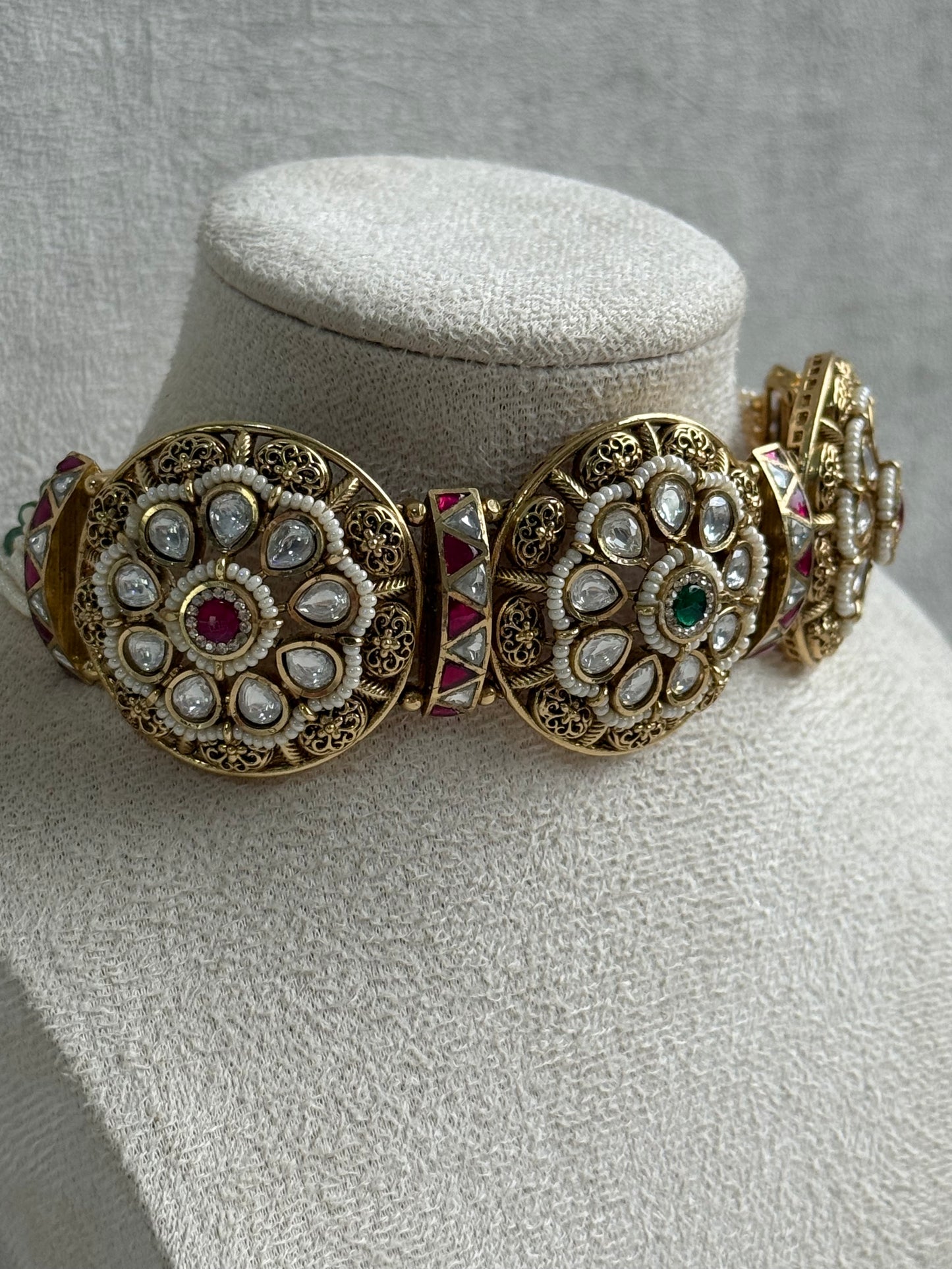 Ayura Designs Tanu Choker Set – Antique Gold Choker & Jhumkis with Ruby & Emerald Kundan and Pearl Borders
