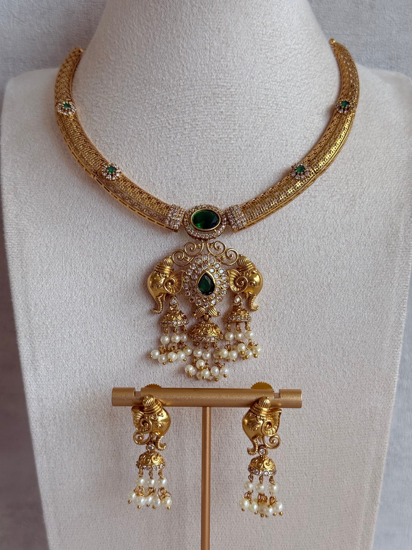 Ayura Designs Wadha Collar Necklace Set with Earrings – Gold Elephant Pendant & Emerald Green Stone Detailing
