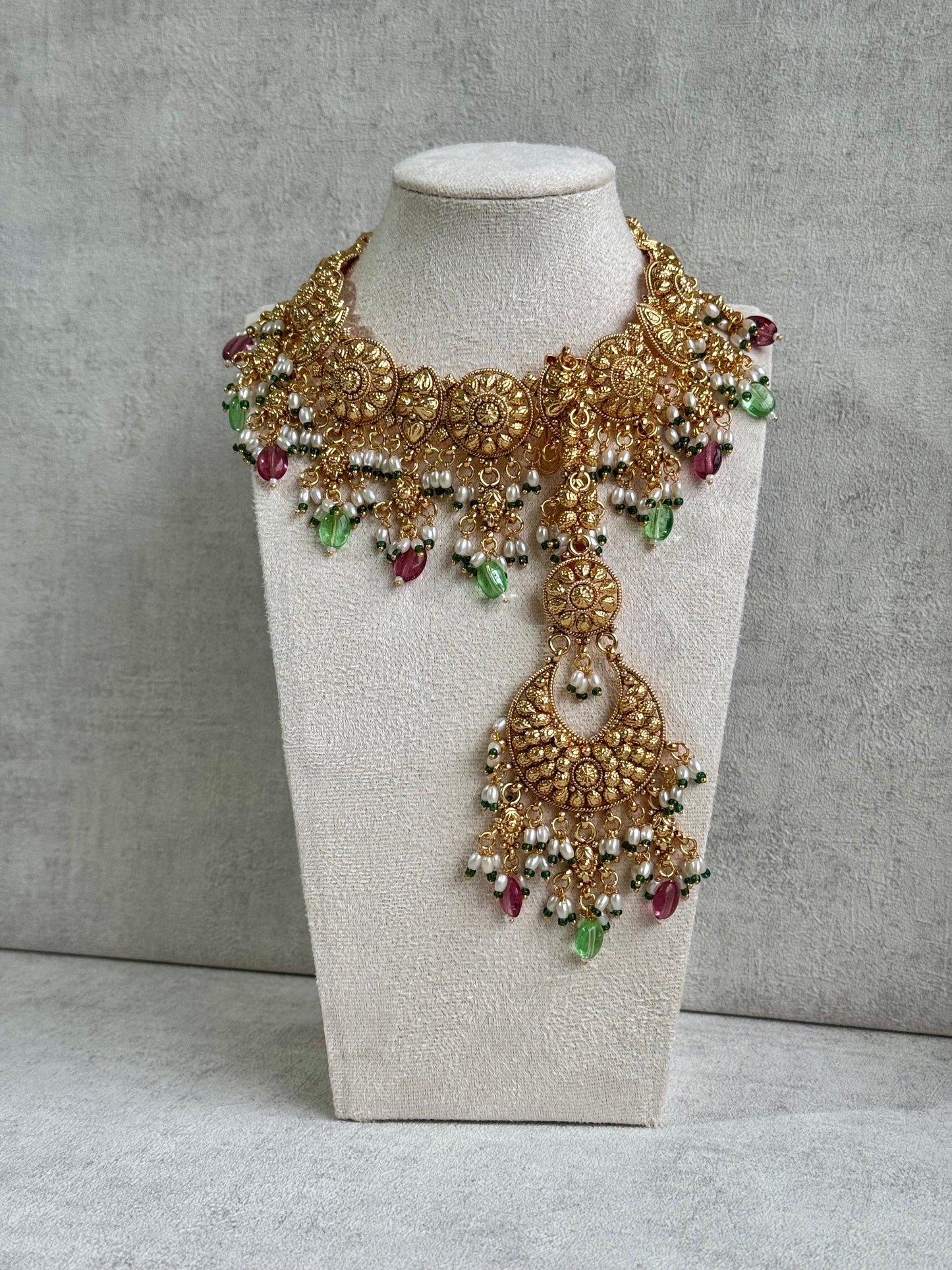 Ayura Designs Rummy Set – Opulent Gold Adornment with Radiant Pink, Green & White Beads | Includes Earrings & Tikka