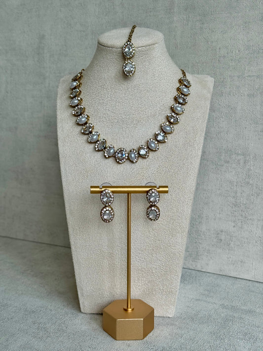 Ayura Designs Eira Set – Necklace, Earrings & Tikka with Diamond-Cut & Ivory Oval Stones in Antique Gold