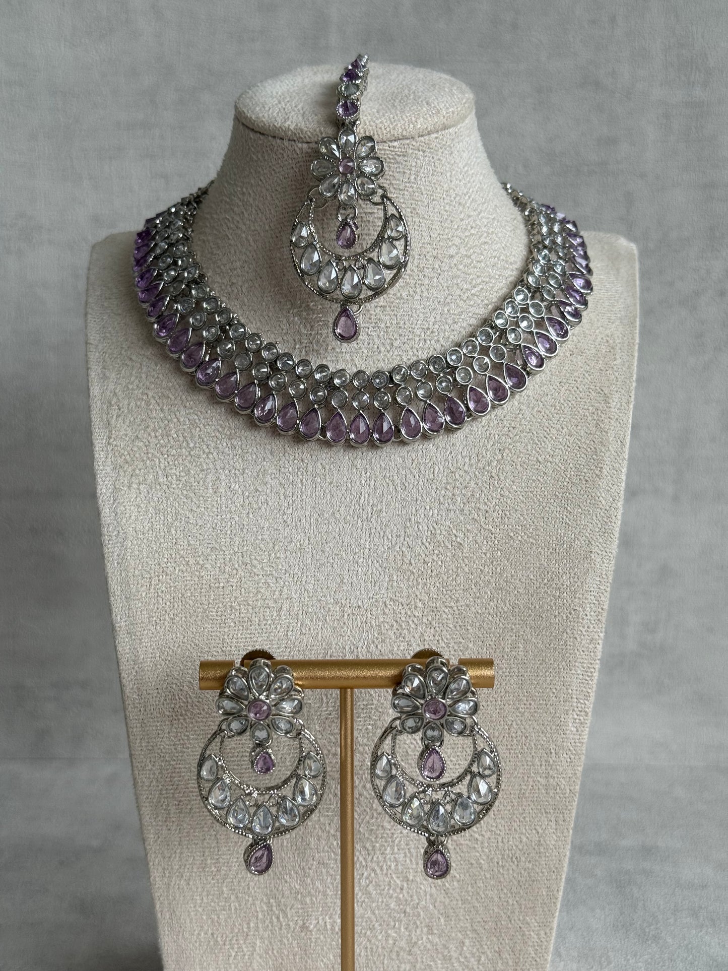 Ayura Designs Qirat Set with Earrings & Tikka – Soft Lilac Stones, Mirror-Cut Detailing & Silver Finish