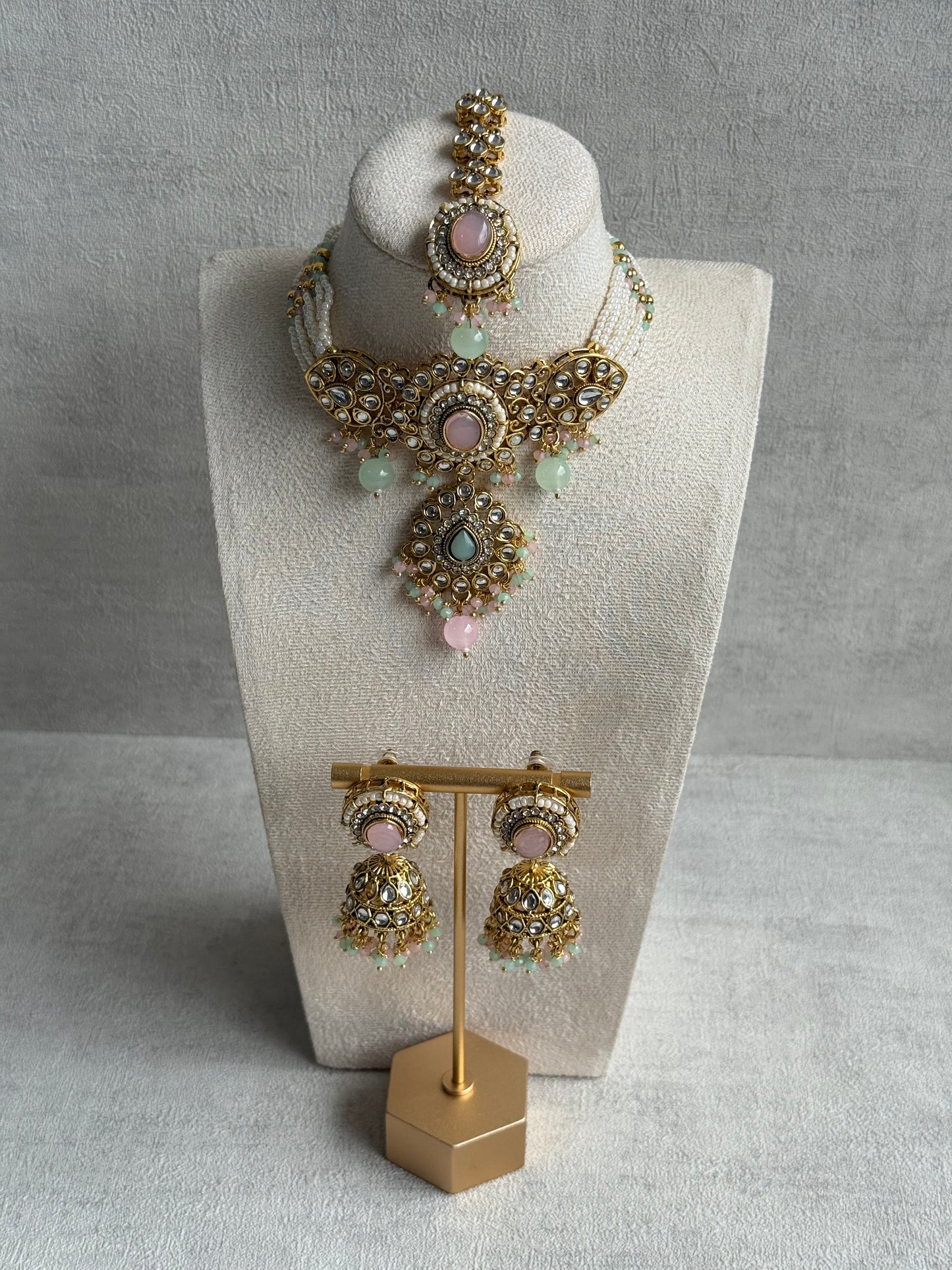 Ayura Designs Muskaan Set – Choker, Jhumkis & Tikka with Blush Pink & Mint Beads, Kundan Stones & Antique Gold Finish