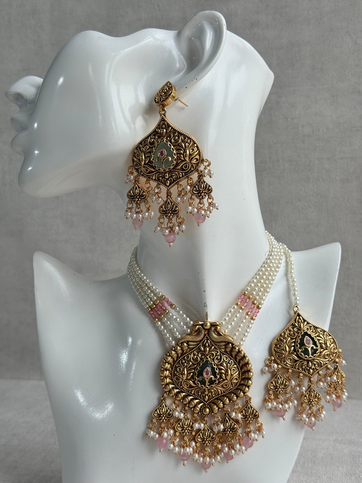 Ayura Designs Afia Necklace Set with Earrings & Tikka – Antique Gold, Blush Pink Pearls, Green Centre Stone & Peacock Motifs