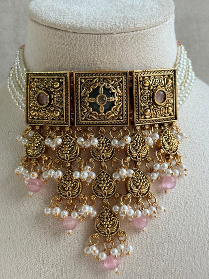 Ayura Designs Samera Choker Set with Earrings & Tikka – Blush Pink Beads, Pearl Detailing, Green Centre Stone, Floral Motifs & Antique Gold Finish