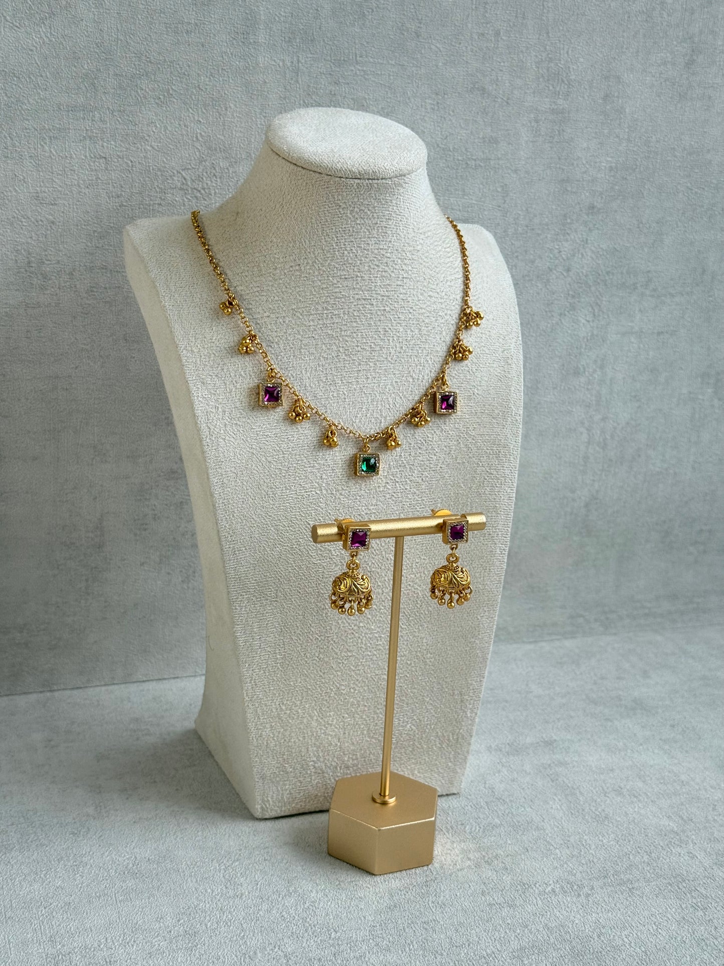 Ayura Designs Smita Set with Necklace & Earrings – Ruby Pink & Emerald Green Stones with Gold-Tone Ghungroo Detailing