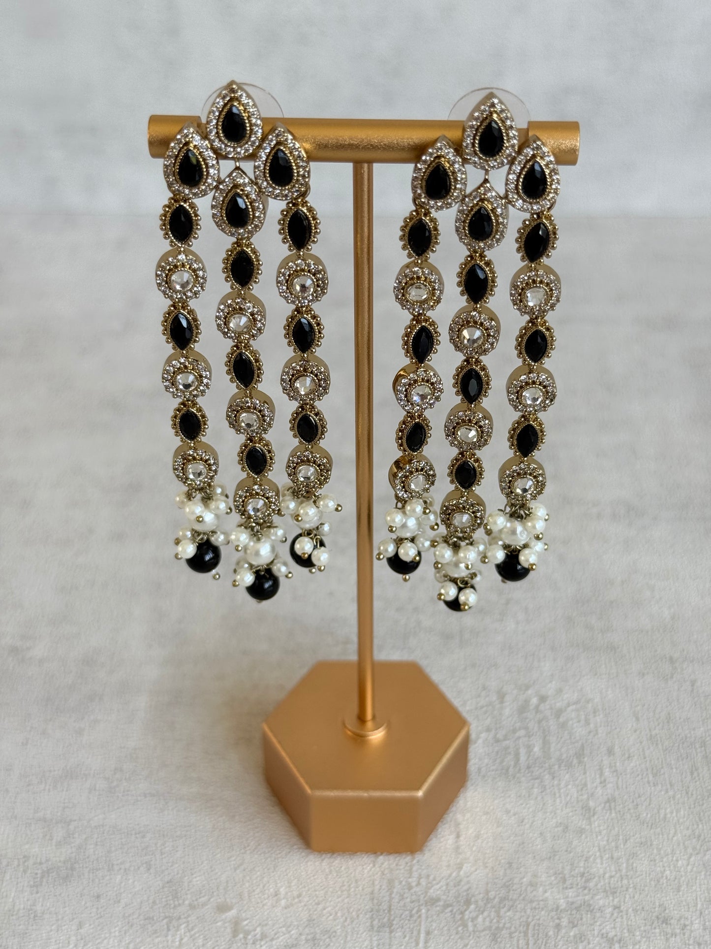 Ayura Designs Emilia Earrings – Gold Triple Strand Statement Earrings with Black Stones & Pearl Drops