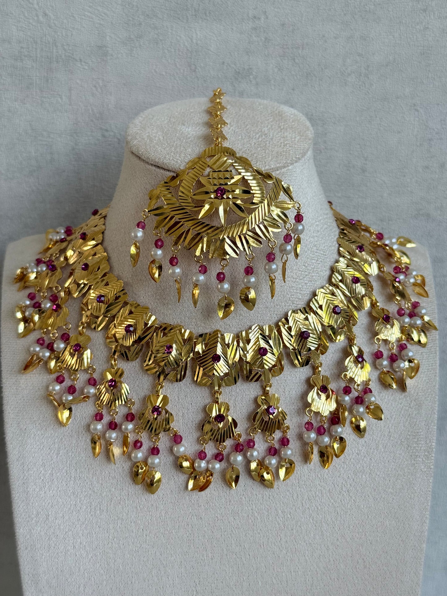 Ayura Designs Baisakhi Set with Earrings & Tikka – Gold Pipal Patti Design with Ruby Pink Beads & Pearl Detailing