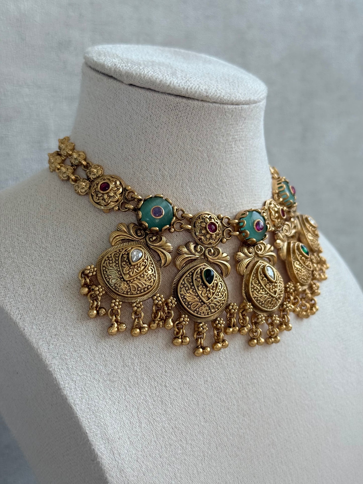Ayura Designs Alera Set with Necklace & Earrings – Peacock Green and Rani Pink with Antique Gold Ghungroo Detailing