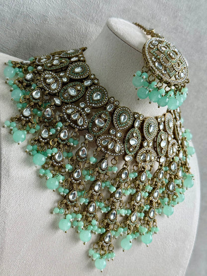 Ayura is Designs Tanya Bridal Set with Necklace, Earrings & Tikka – Pistachio Mint Beads, Mirror-Cut Stones and Antique Gold Finish