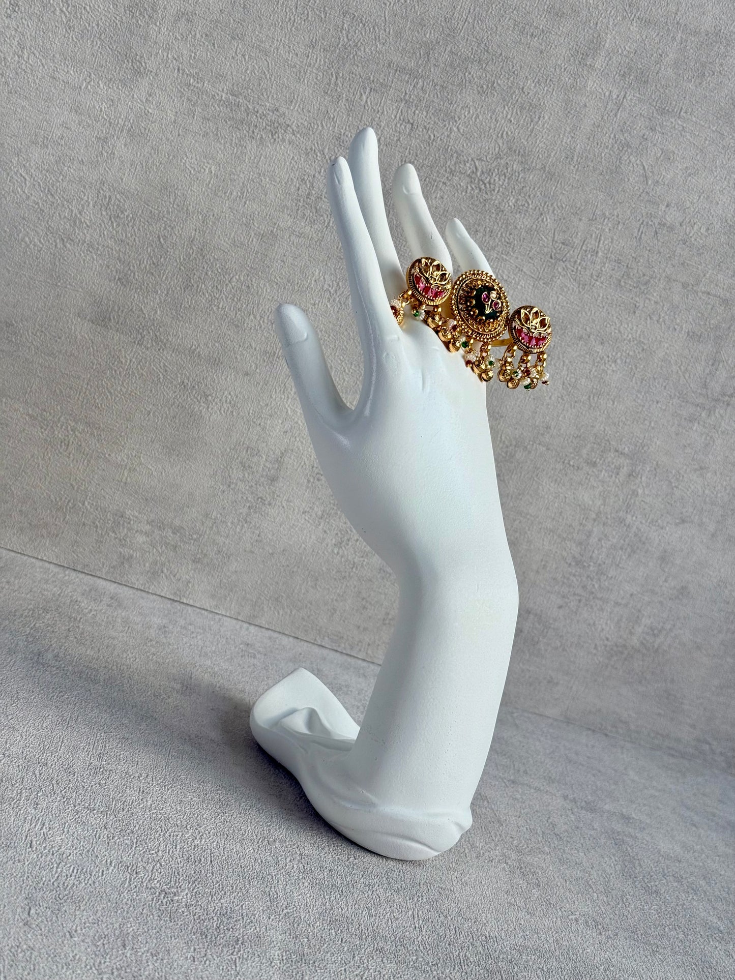 Ayura Designs Raha Adjustable Ring – Antique Gold Lotus Motifs with Emerald Green & Rani Pink Stones, Pearl Drops & Ghungroo Detailing