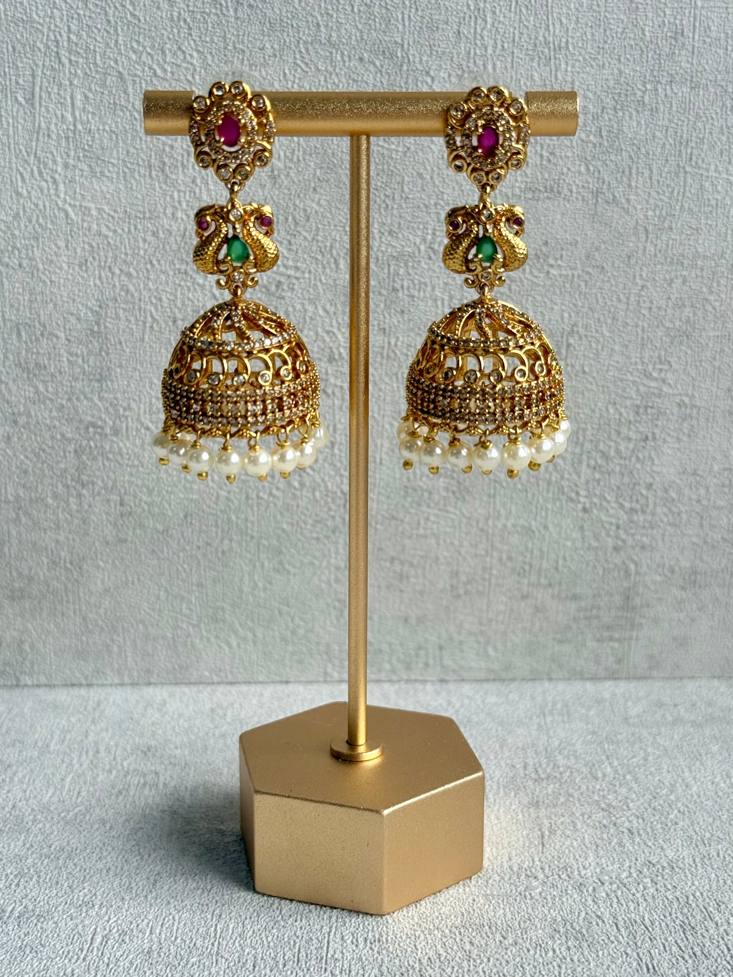 Ayura Designs Darya Jhumkis – Gold Peacock Motif Jhumkis with Ruby Pink, Emerald Green and Pearl Detailing