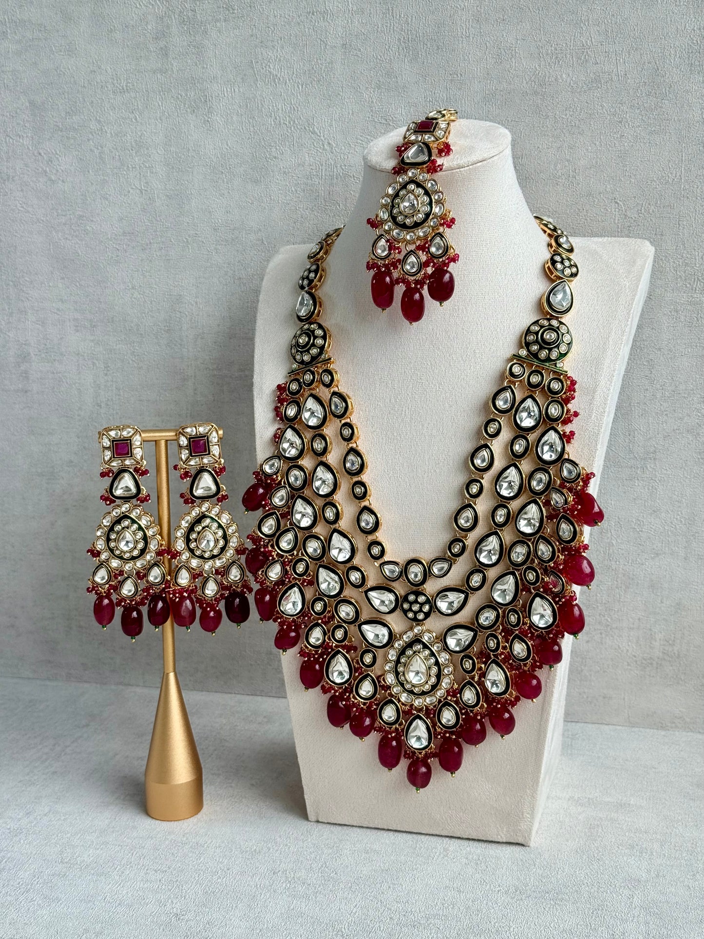Ayura Designs Zahira Bridal Set with Necklace, Earrings & Tikka – Kundan Detailing with Green Enamel, Ruby Pink Stones & Maroon Bead Drops
