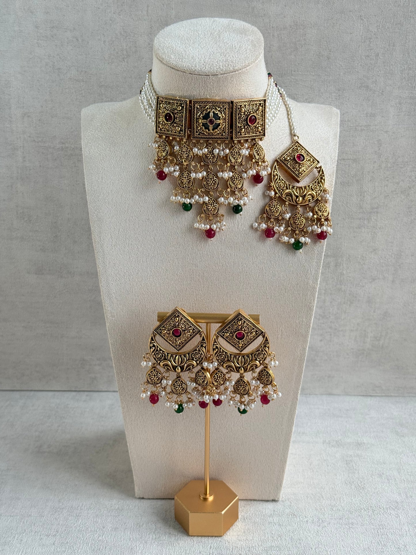 Ayura Designs Samera Choker Set with Earrings & Tikka – Rani Pink & Emerald Green Beads, Pearl Detailing, Green Centre Stone, Floral Motifs & Antique Gold Finish