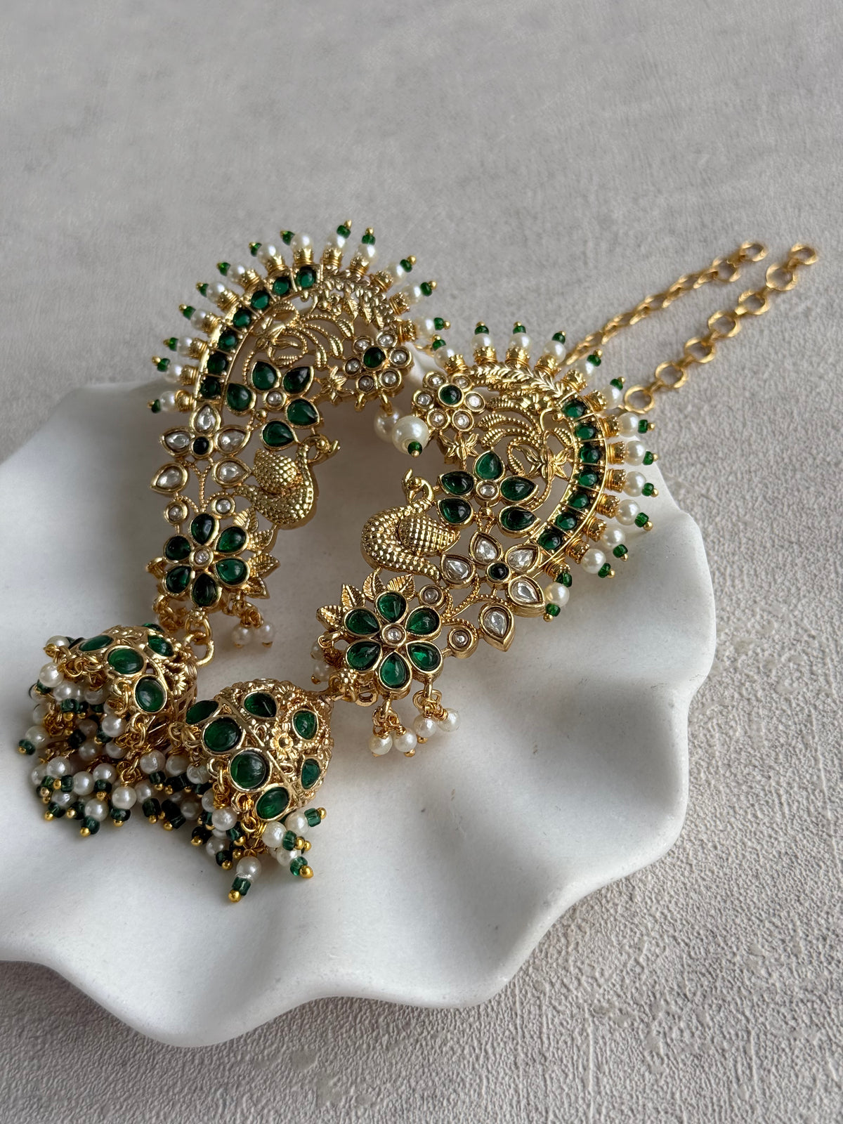 Ayura Designs Nitya Kaanphool Jhumkis – Gold Peacock Motifs, Emerald Green Kundan & Pearl Drops with Attached Sahare