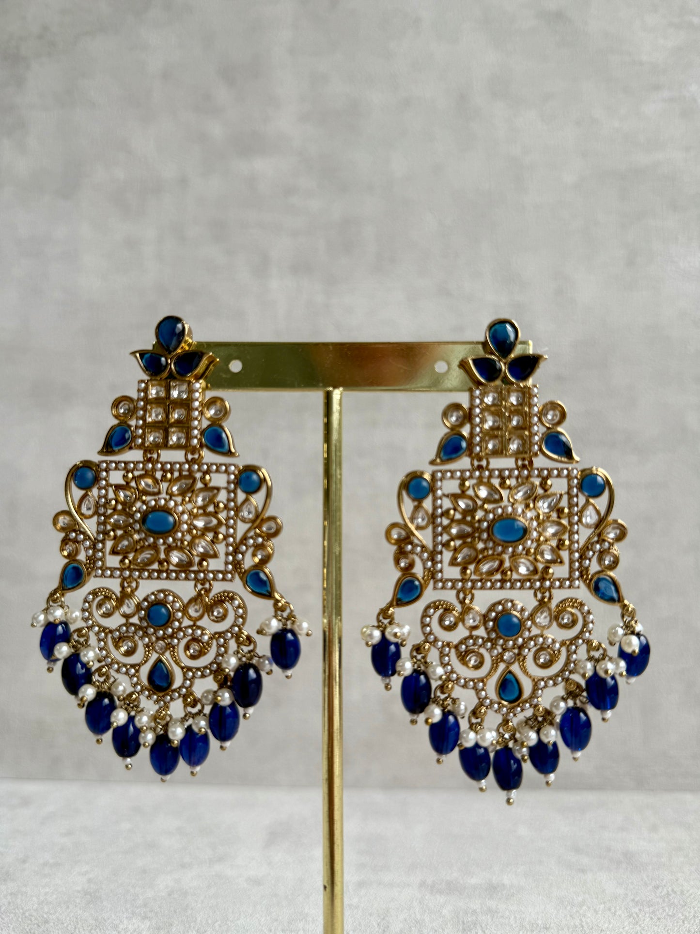 Ayura Designs Arwa Earrings – Antique Gold Finish with Midnight Blue Stones & Pearl Detailing
