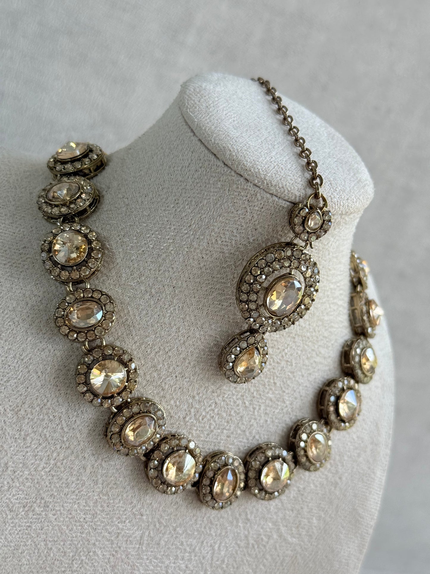 Ayura Designs Eira Necklace Set with Earrings & Tikka – Champagne Gold Crystal Stones with Antique Gold Finish