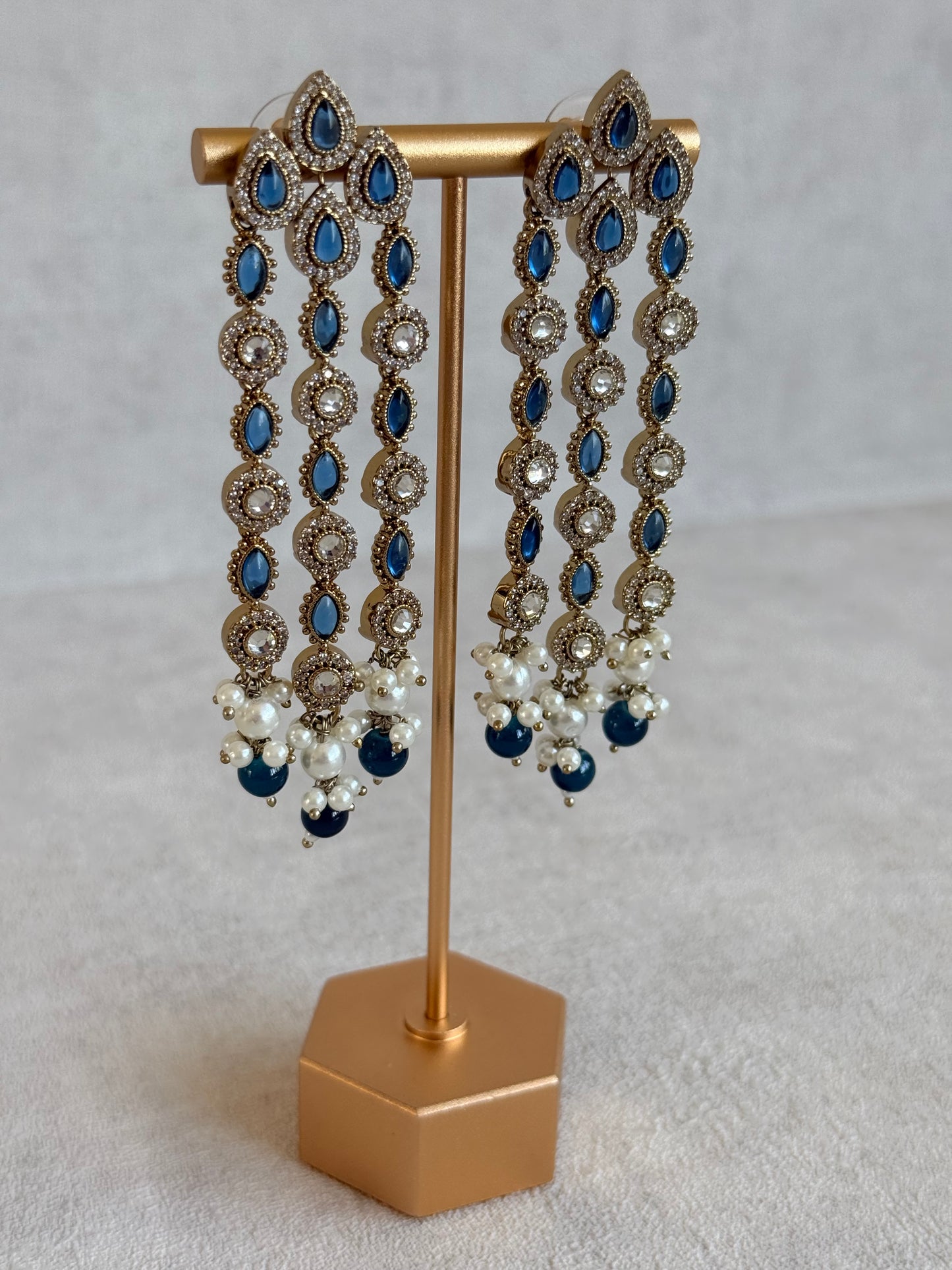 Ayura Designs Emilia Earrings – Gold Triple Strand Statement Earrings with Ink Blue Stones & Pearl Drops