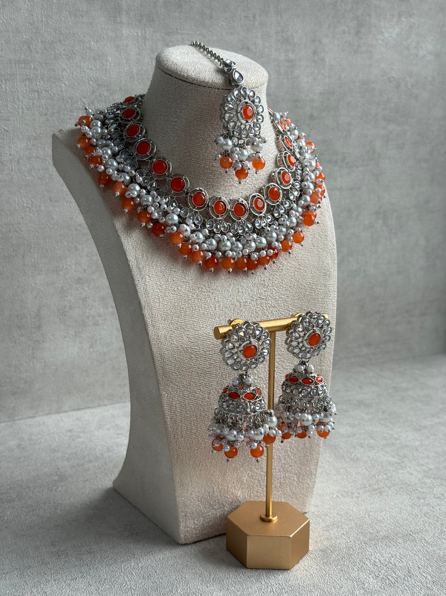 Ayura Designs Barira Set – Necklace, Jhumkis & Tikka with Orange Stones, Pearls & Antique Silver Finish