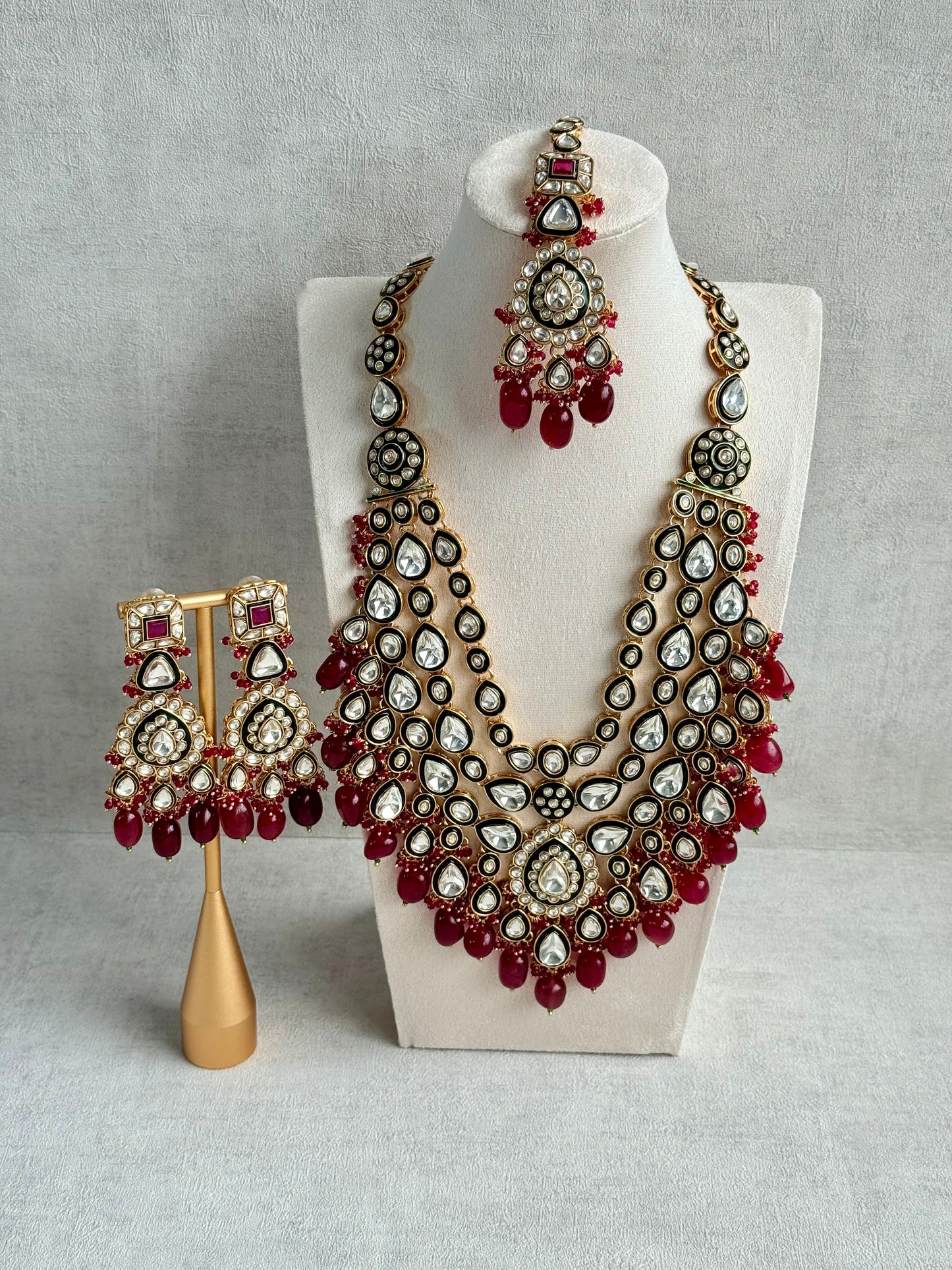 Ayura Designs Zahira Bridal Set with Necklace, Earrings & Tikka – Kundan Detailing with Green Enamel, Ruby Pink Stones & Maroon Bead Drops