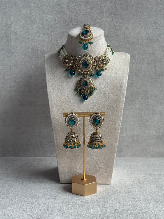 Ayura Designs Muskaan Set – Choker, Jhumkis & Tikka with Peacock Blue Beads, Kundan Stones & Antique Gold Finish