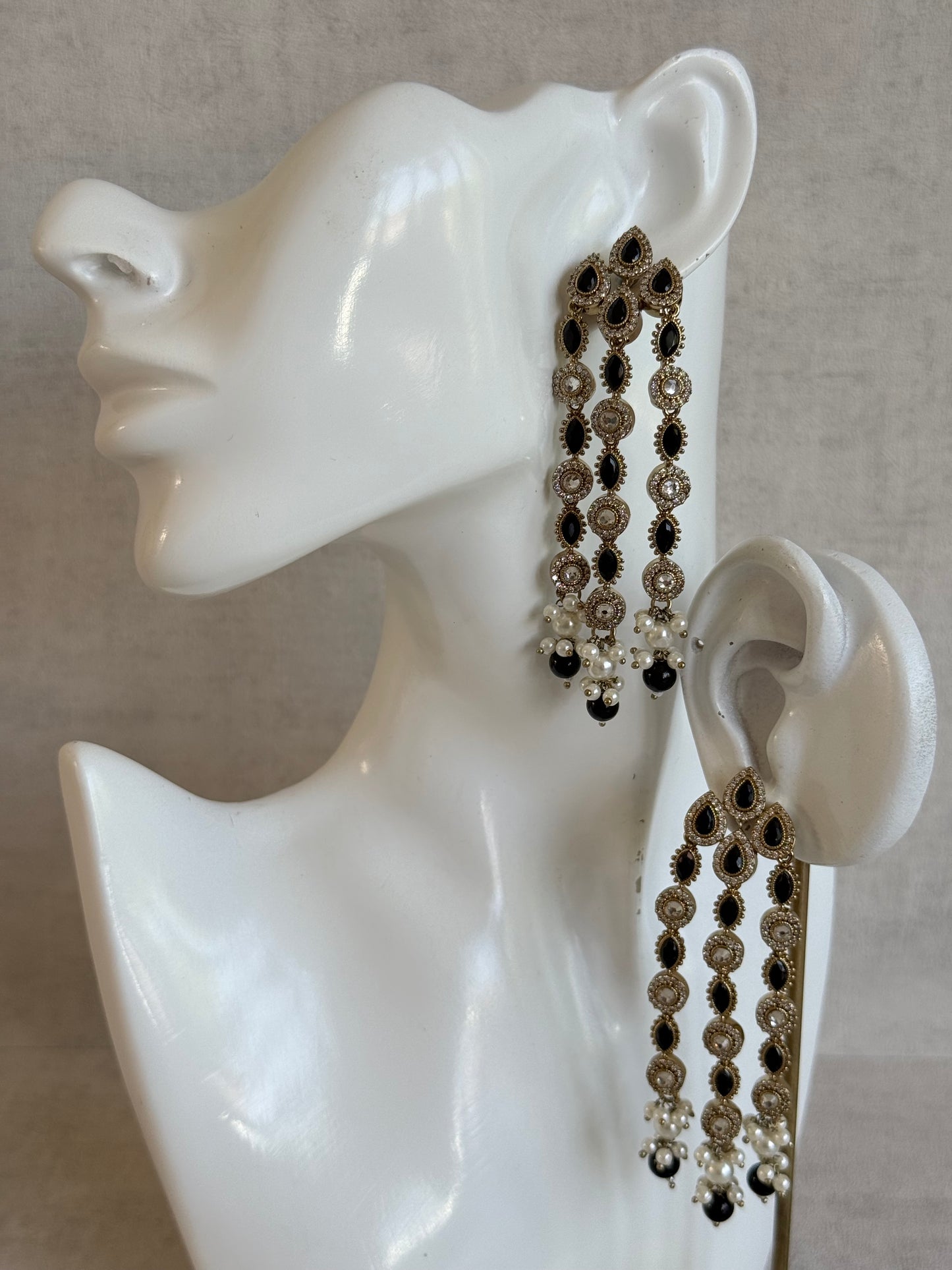 Ayura Designs Emilia Earrings – Gold Triple Strand Statement Earrings with Black Stones & Pearl Drops