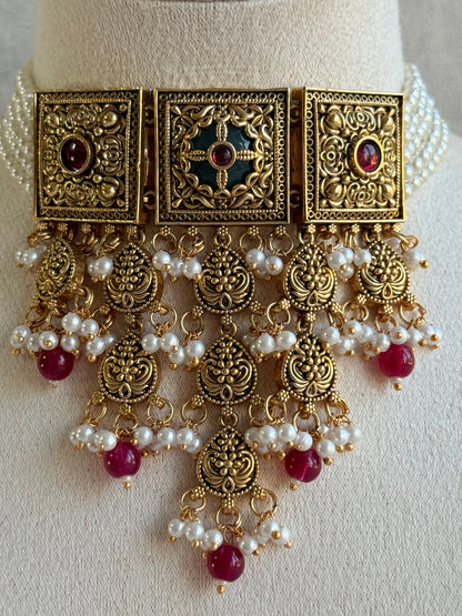 Ayura Designs Samera Choker Set with Earrings & Tikka – Rani Pink Beads, Pearl Detailing, Green Centre Stone, Floral Motifs & Antique Gold Finish