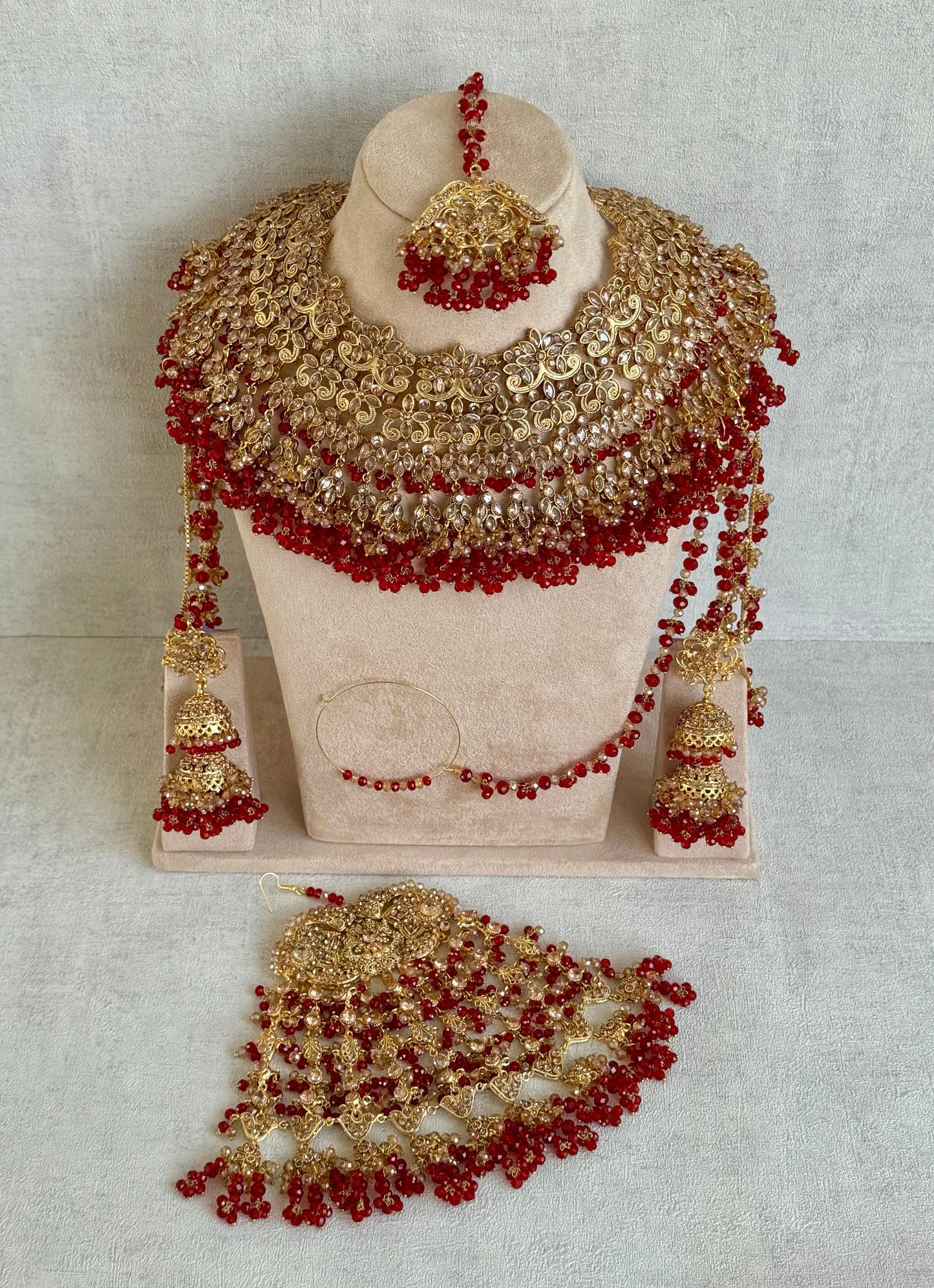 Ayura Designs Ishqiya Bridal Set with Necklace, Jhumkis with Sahare, Tikka & Jhoomer – Antique Gold, Champagne Stones & Red Bead Detailing