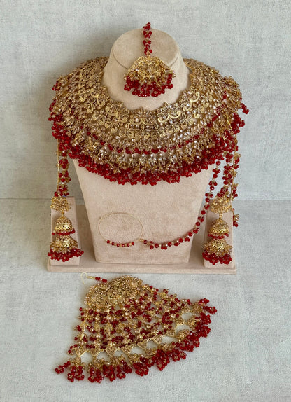 Ayura Designs Ishqiya Bridal Set with Necklace, Jhumkis with Sahare, Tikka & Jhoomer – Antique Gold, Champagne Stones & Red Bead Detailing