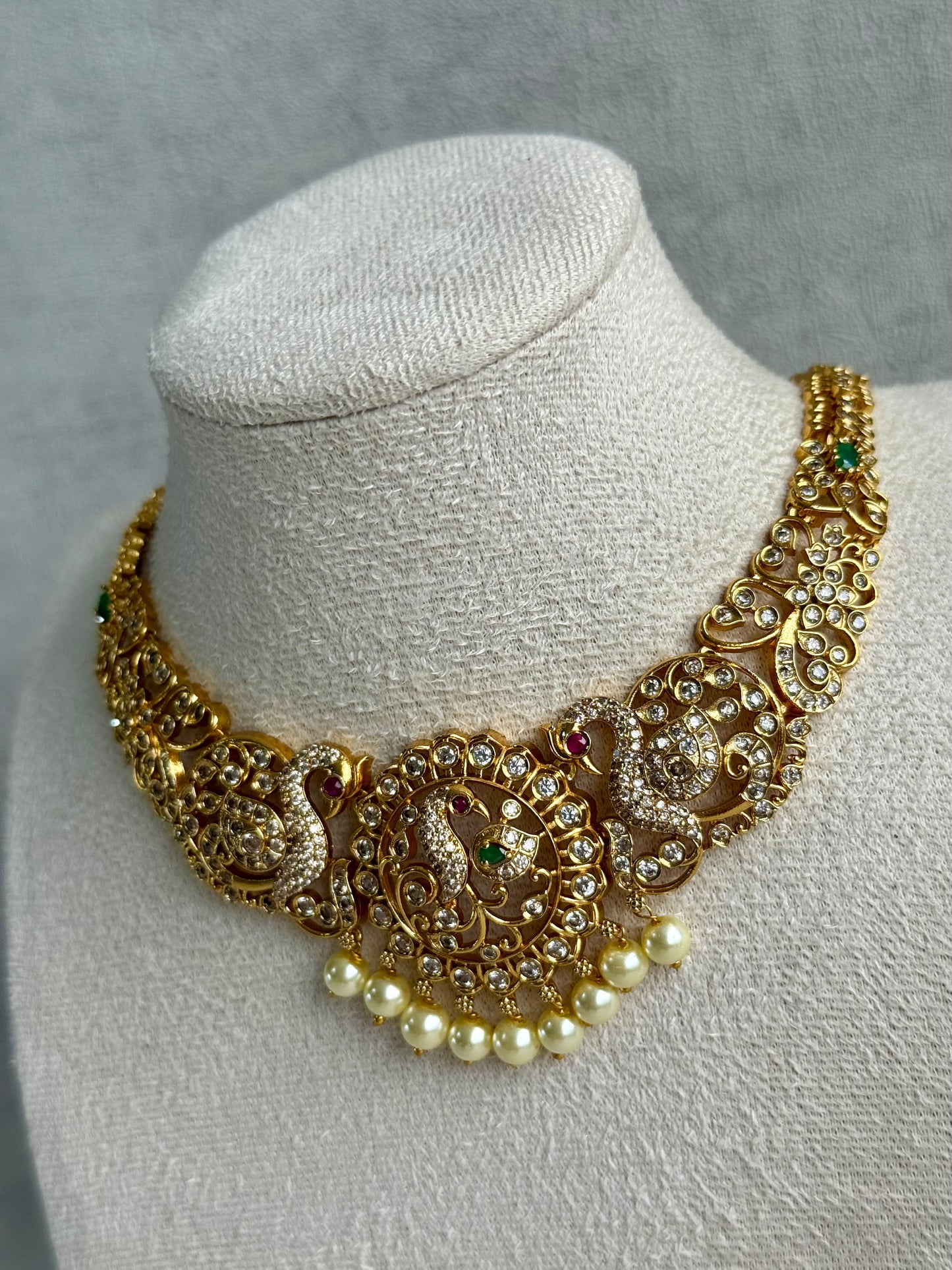 Ayura Designs Vedya Set – Antique Gold Peacock Necklace with Kundan, Emerald & Pearl Detailing
