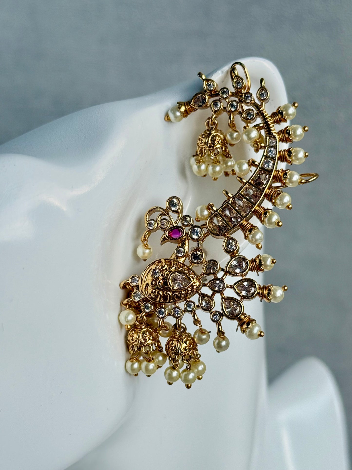 Ayura Designs Megha Half Ear Cuff Earrings – Gold Peacock Motif with Kundan Crystals, Pink Stone Accents & Pearl Jhumka Drops