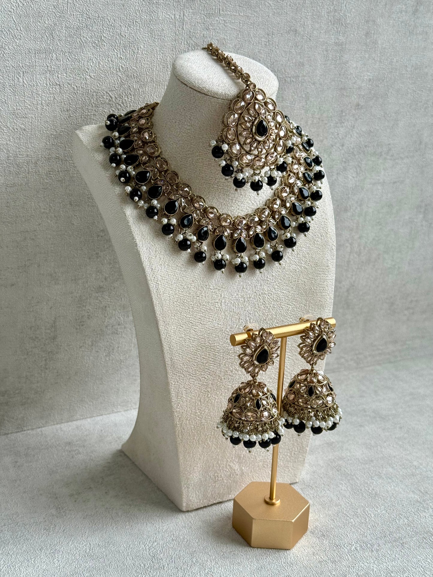 Ayura Designs Emaan Set with Jhumkis & Tikka – Black Beads, Mirror-Cut Stones & Antique Gold Finish