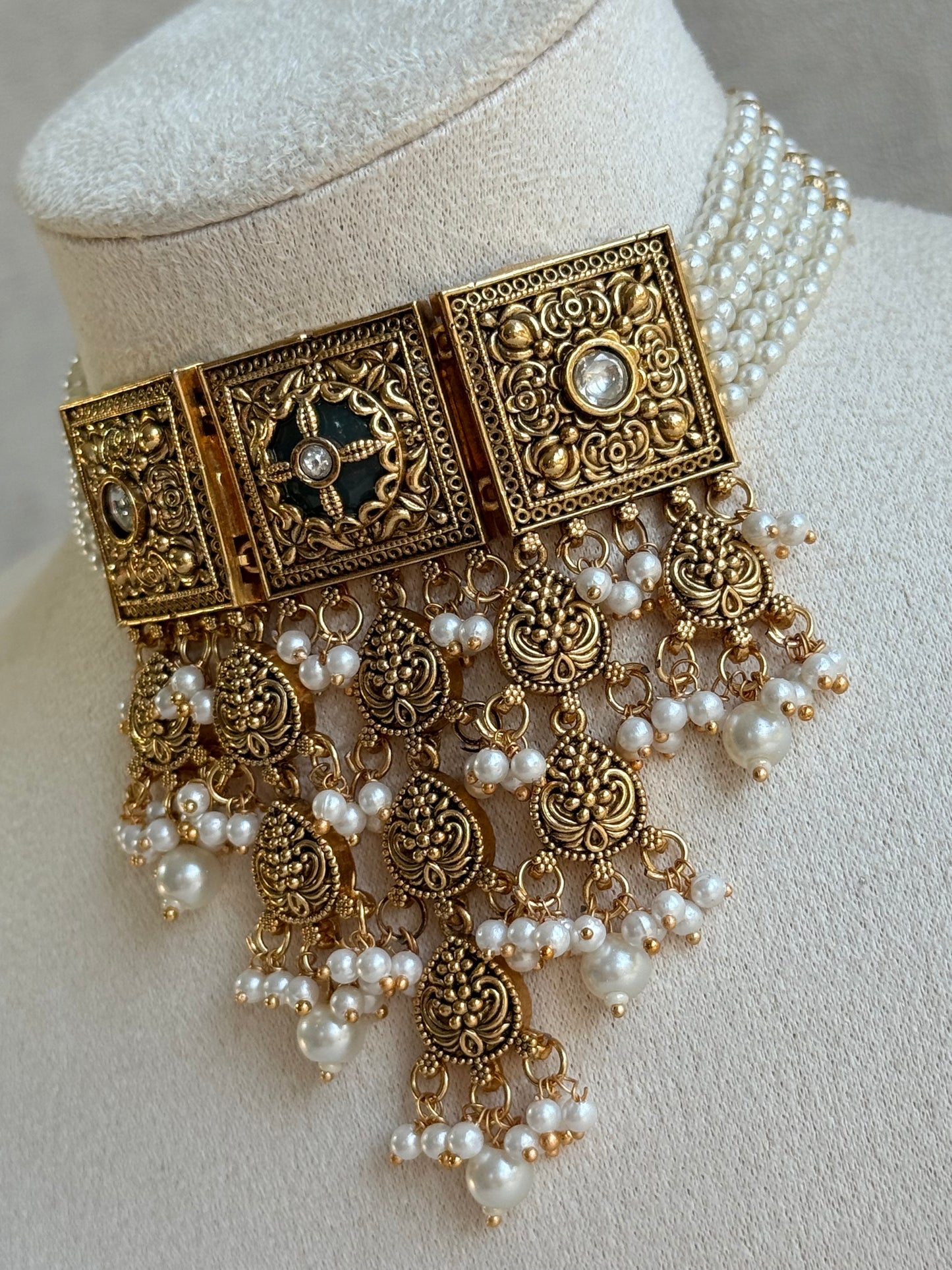Ayura Designs Samera Choker Set with Earrings & Tikka – Ivory Beads, Pearl Detailing, Green Centre Stone, Floral Motifs & Antique Gold Finish