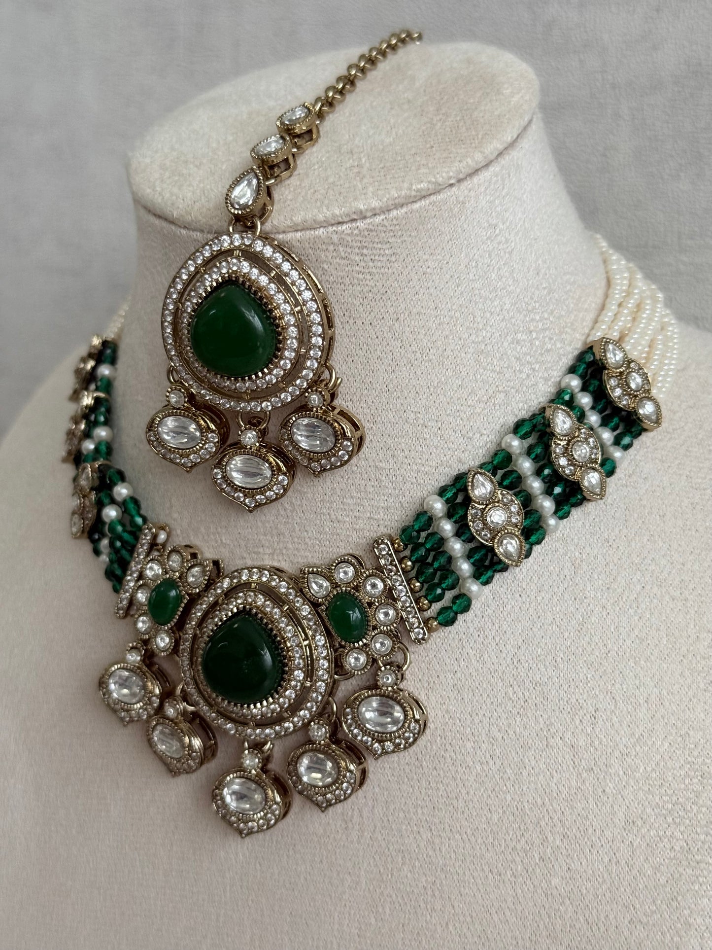Ayura Designs Rahi Necklace Set with Earrings & Tikka – Emerald Green Stones with Mirror-Cut Detailing & Pearl Strands