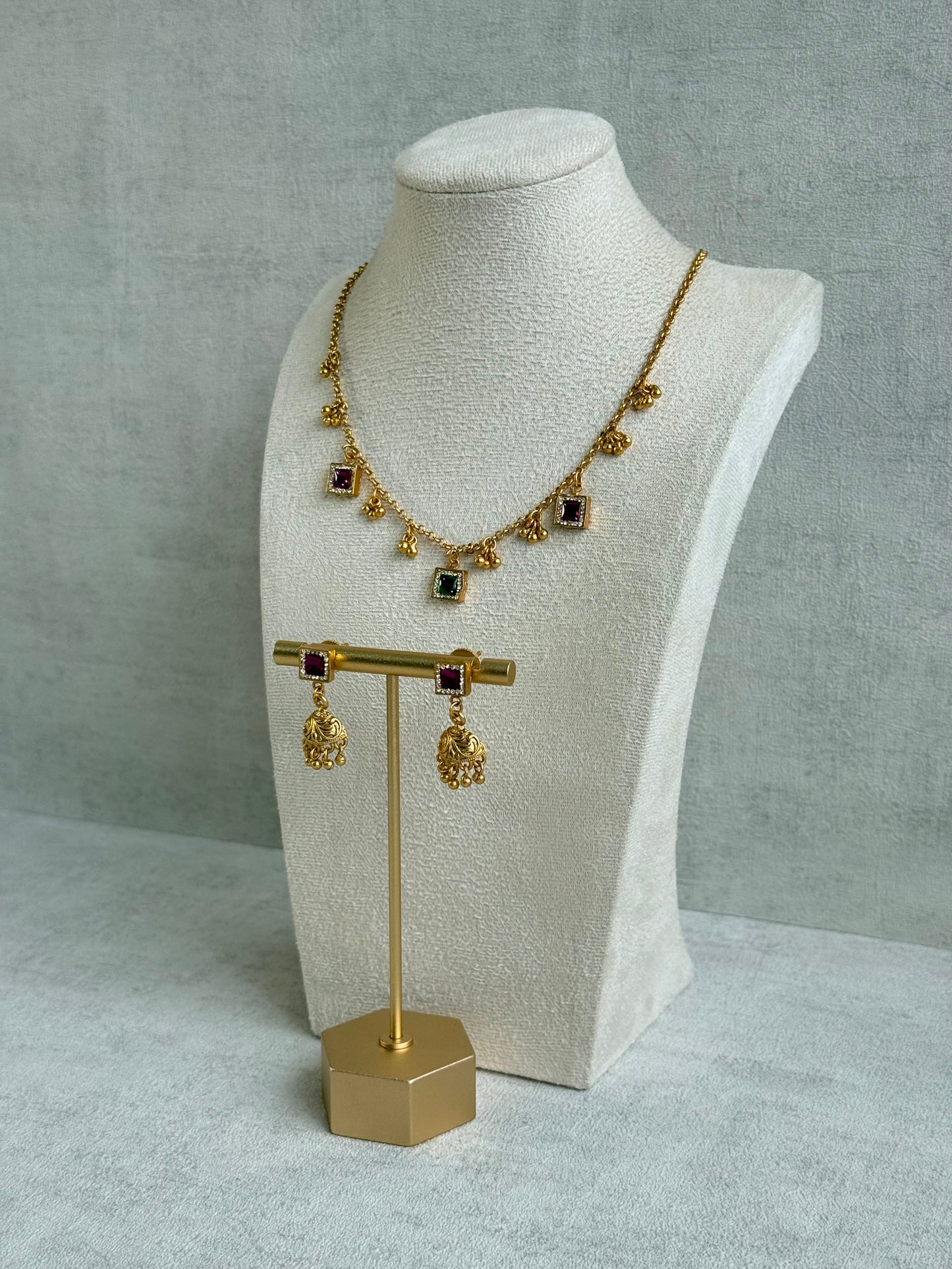 Ayura Designs Smita Set with Necklace & Earrings – Ruby Pink & Emerald Green Stones with Gold-Tone Ghungroo Detailing