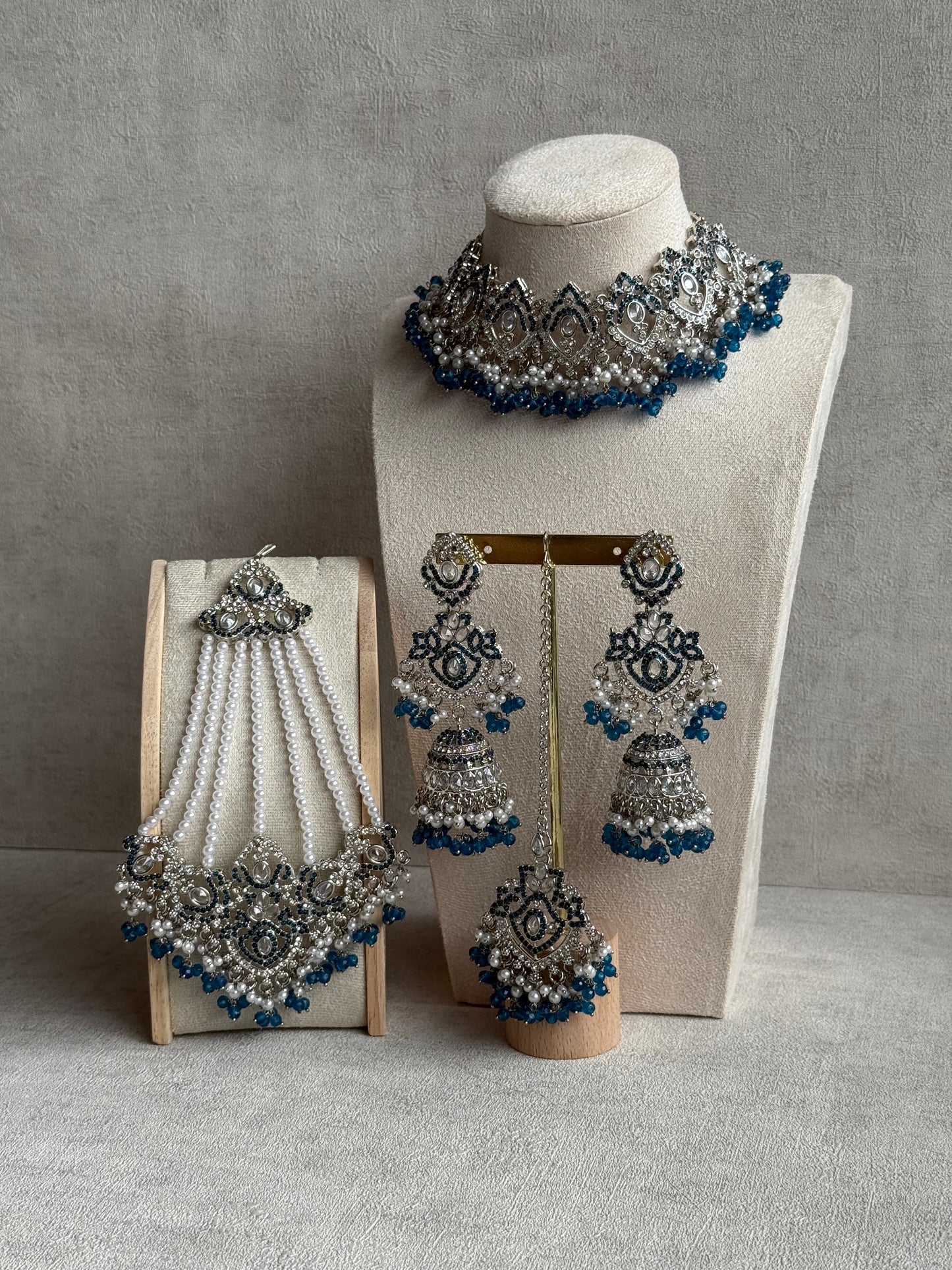 Ayura Designs Wania Set with Jhumkis, Tikka & Passa – Peacock Blue Beads, Mirror-Cut Stones & Antique Silver Finish