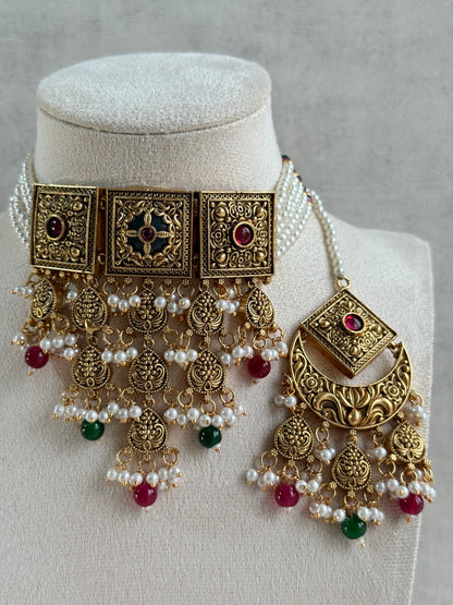 Ayura Designs Samera Choker Set with Earrings & Tikka – Rani Pink & Emerald Green Beads, Pearl Detailing, Green Centre Stone, Floral Motifs & Antique Gold Finish