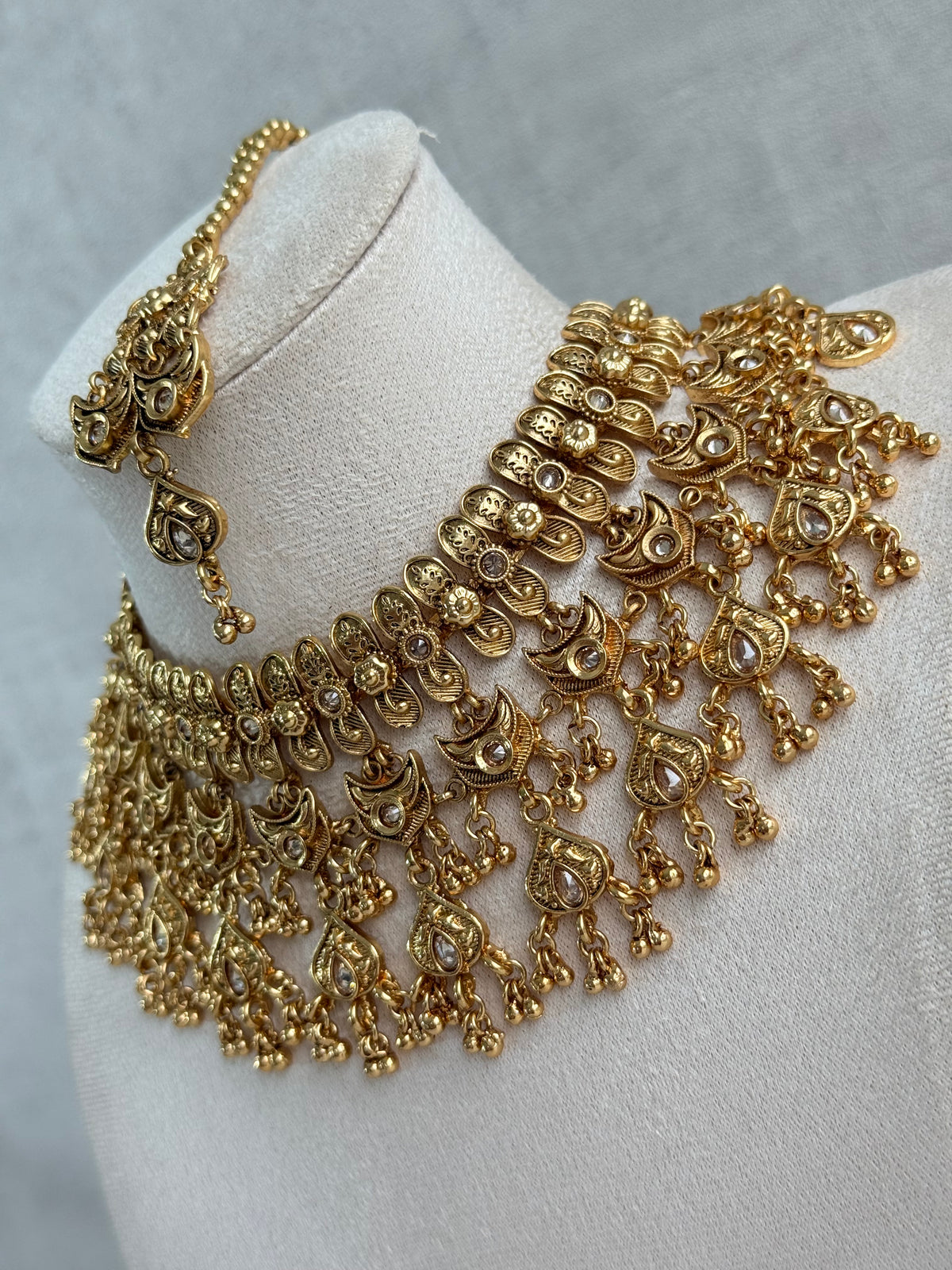 Ayura Designs Sifat Bridal Set with Earrings & Tikka – Antique Gold Kundan Waterfall Design with Paisley & Ghungroo Drops
