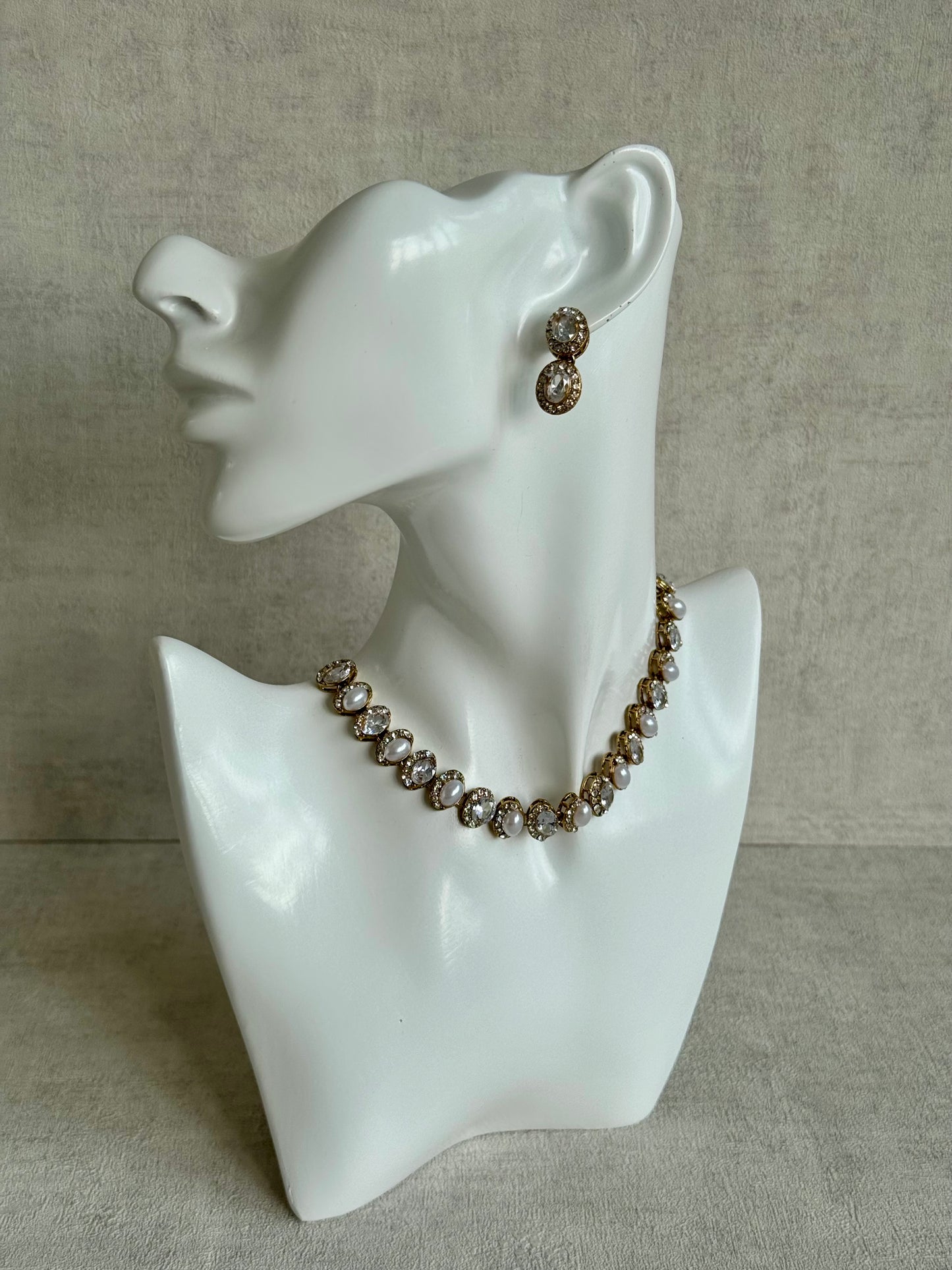 Ayura Designs Eira Set – Necklace, Earrings & Tikka with Diamond-Cut & Ivory Oval Stones in Antique Gold
