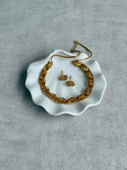 Ayura Designs Veda Set – Antique Gold Necklace & Stud Earrings with Elephant Motifs and Pink Stone Detailing