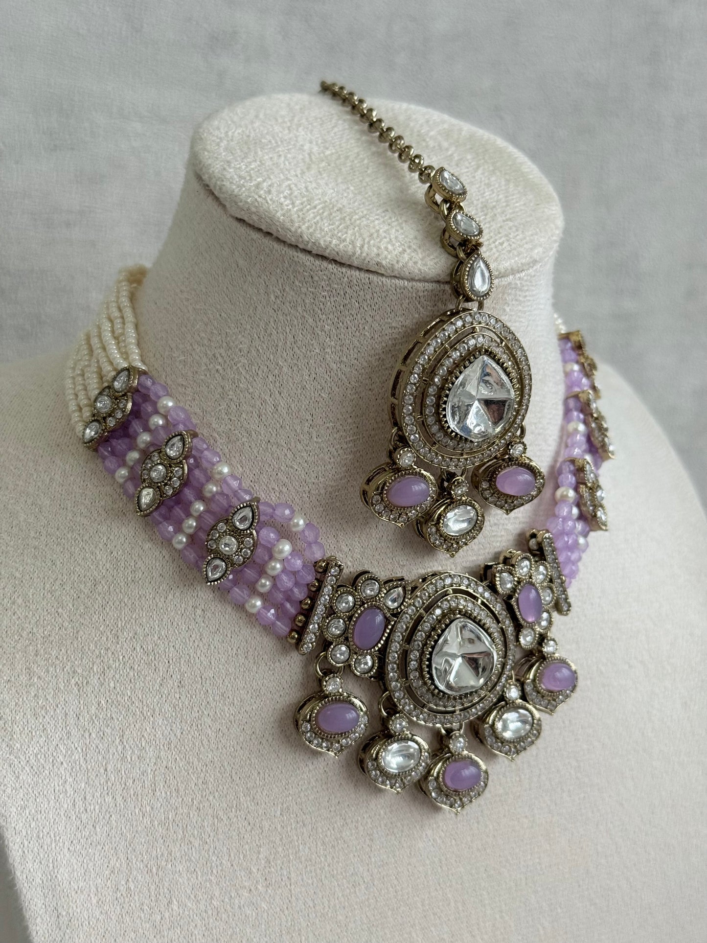 Ayura Designs Rahi Necklace Set with Earrings & Tikka – Lilac Stones with Mirror-Cut Detailing & Pearl Strands